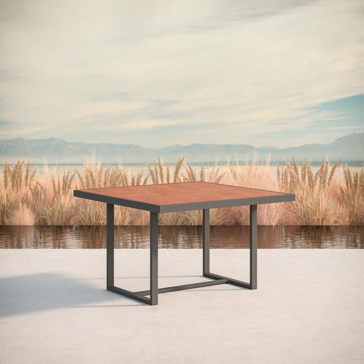 Azzurro Living Pavia 48 Inch Charcoal Aluminum Dining Table W/ Umber Dekton Top - Lifestyle thumbnail