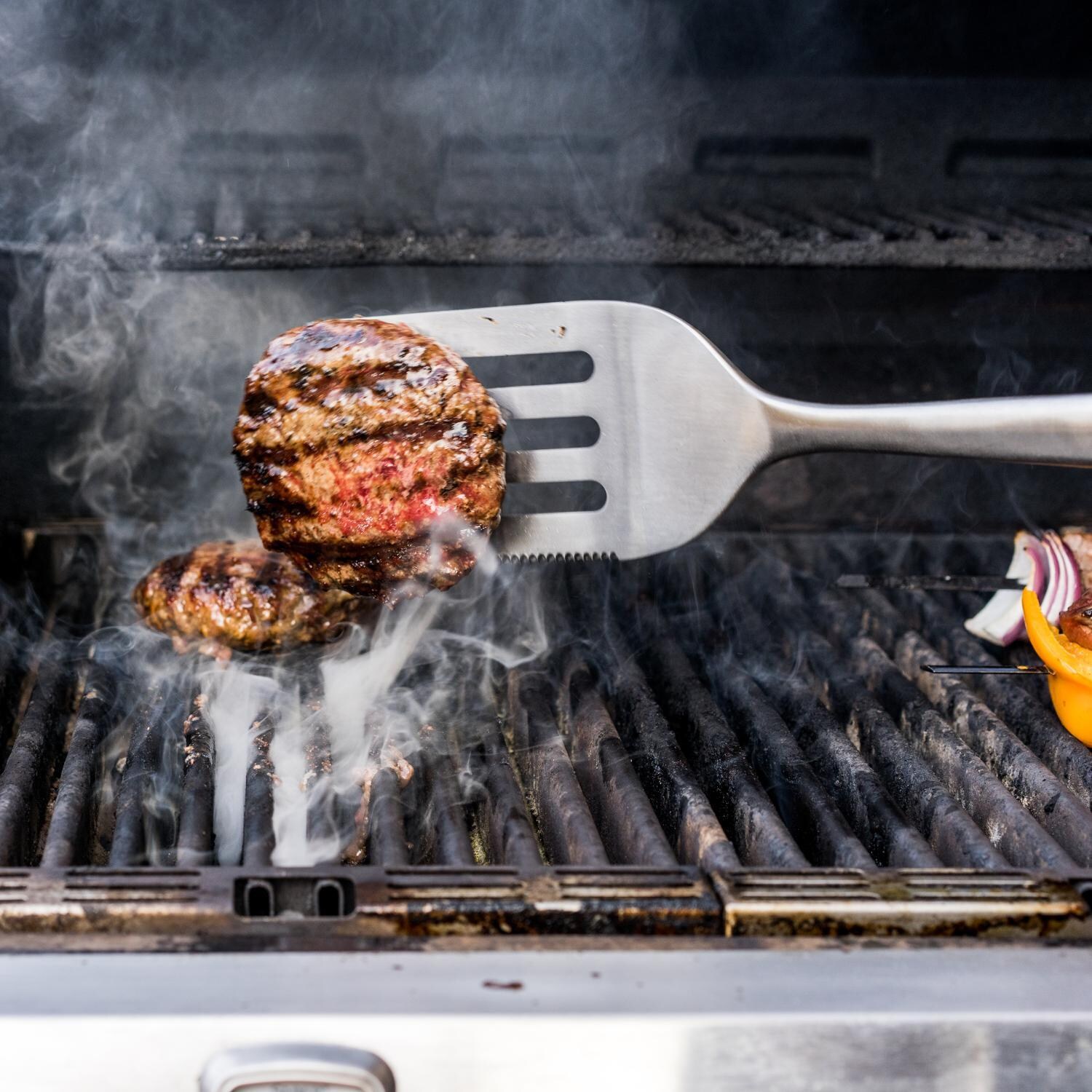 Drip EZ V2 Grill Master Bundle - Black - Spatula - In Use - Lifestyle thumbnail