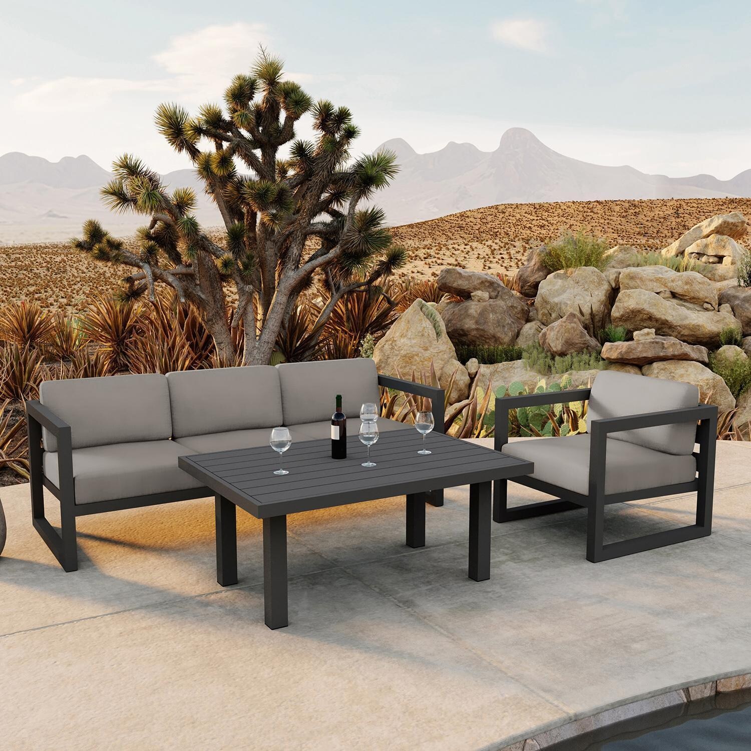 Misty Cove 3 Piece Seating Set in Slate w/Chat Table & Canvas Charcoal Cushions by Lakeview - Lifestyle thumbnail
