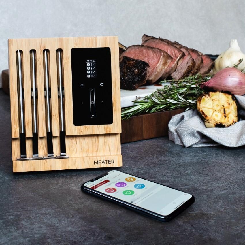 MEATER Block OSC-MT-MB01 WiFi Smart Meat Thermometer - Block and App in Front of Cooked Food - Lifestyle thumbnail