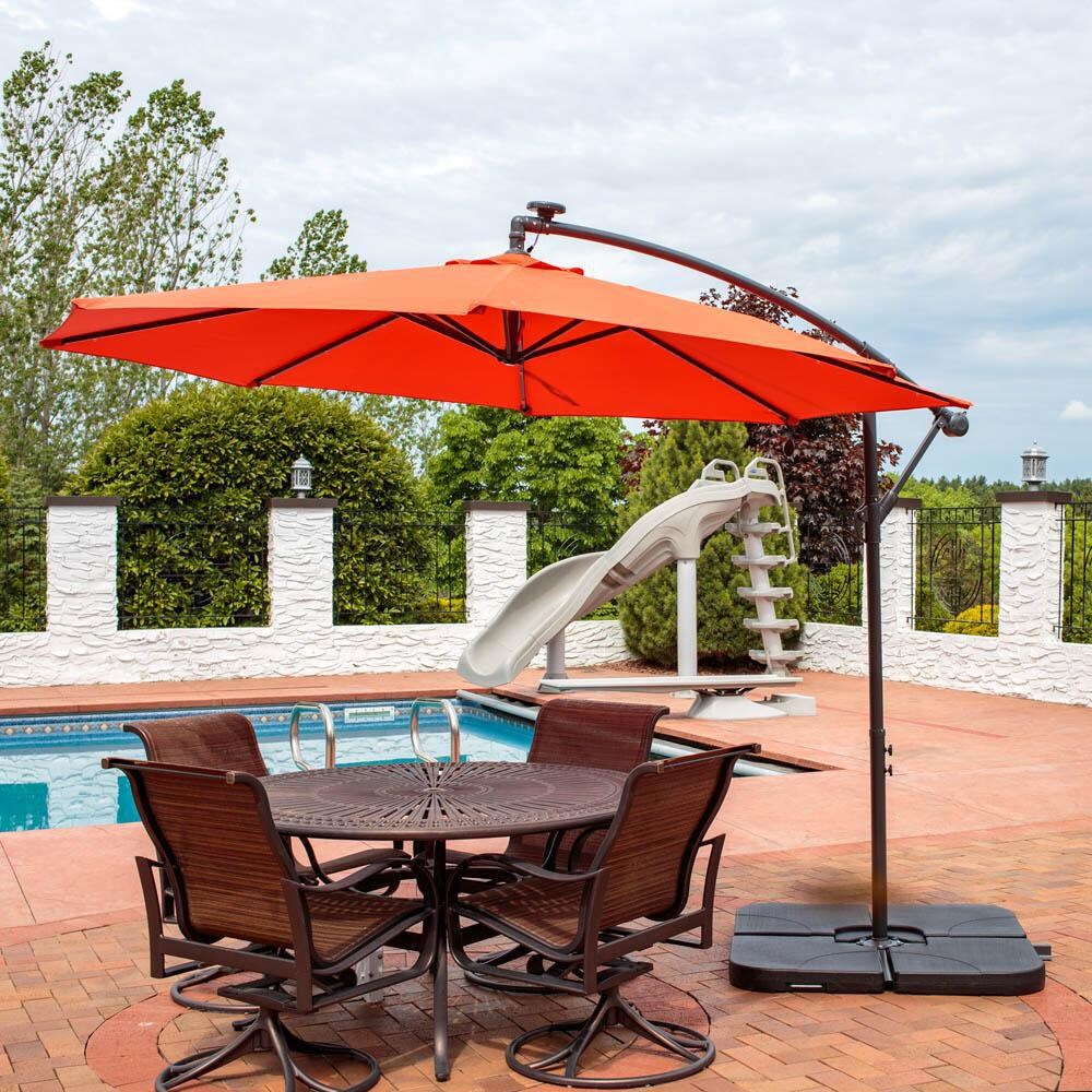 Ultimate Patio 10 Ft. Solar Lighted Octagonal Patio Cantilever Umbrella W/ Crank - Burnt Orange - Lifestyle View thumbnail