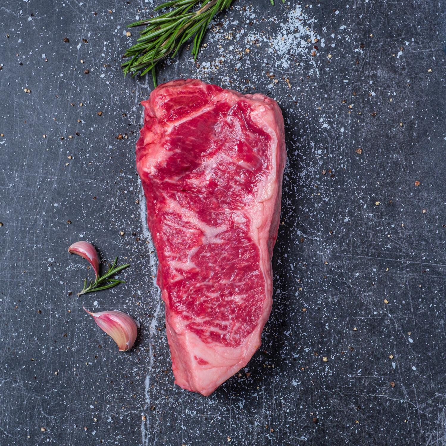 USDA Prime Boneless Strip Steaks, 16 oz (4) | BBQGuys USA Premium Cuts image