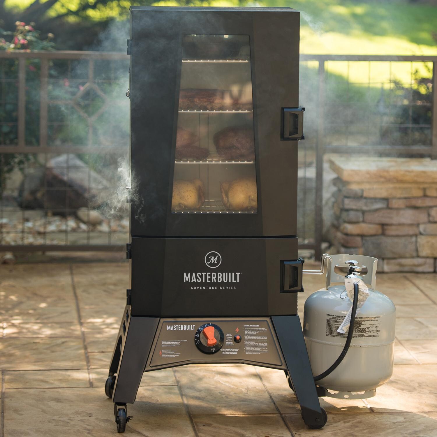 Masterbuilt MB21051416 Adventure Series MES 340G ThermoTemp XL Propane Smoker - Lifestyle View thumbnail