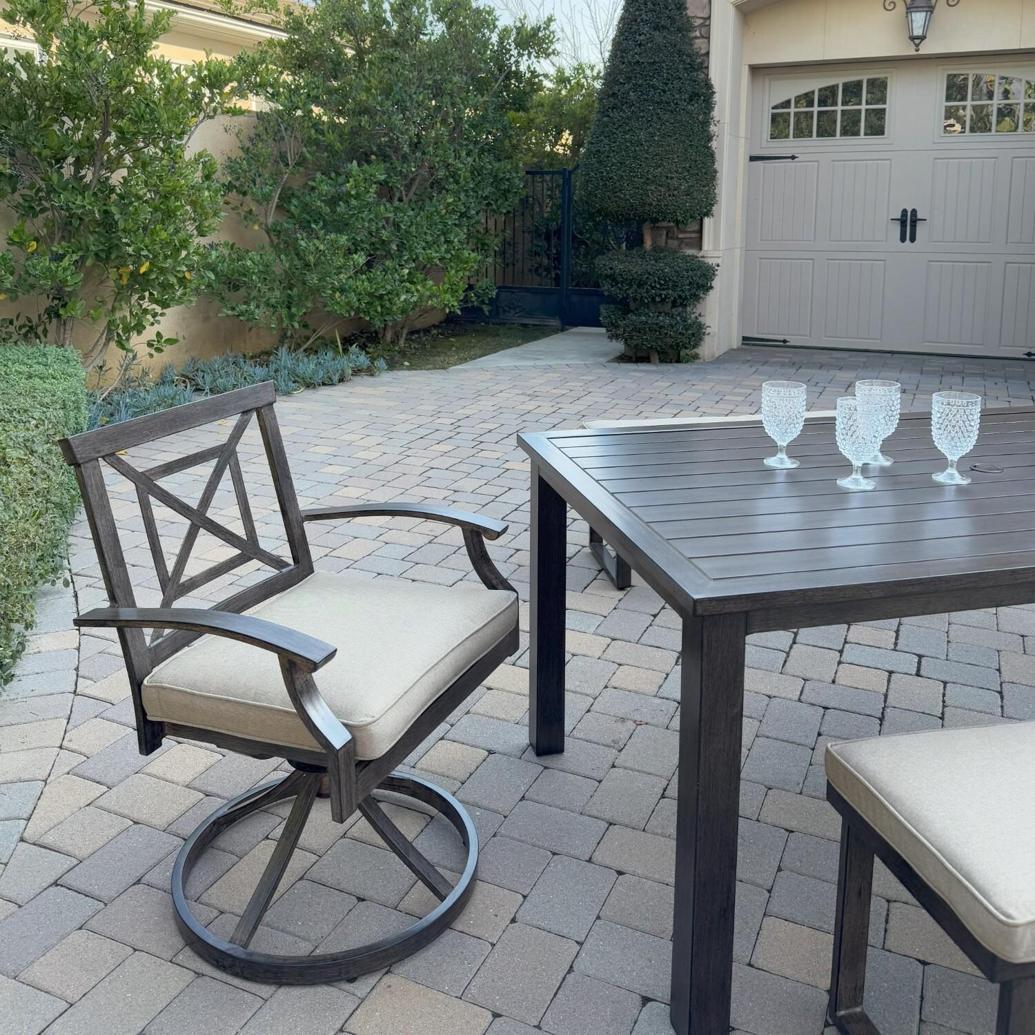 Atlantis 5 Pc Aluminum Dining Set w/ 2 Swivel Rocker Dining Arm Chairs & 2 Two Person Benches in Walnut/Beige by Darlee - Chair At Table - Lifestyle thumbnail