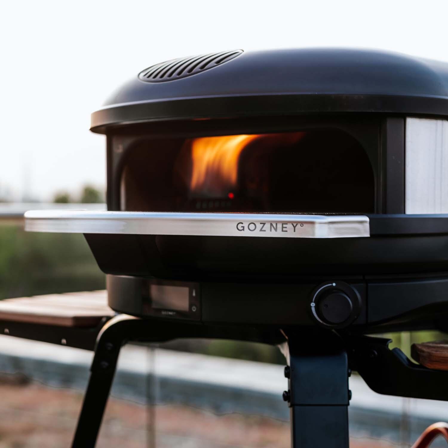 Gozney GAPOBUS1425 Black Arc Propane Pizza Oven Bundle - Oven on Stand - Lifestyle thumbnail