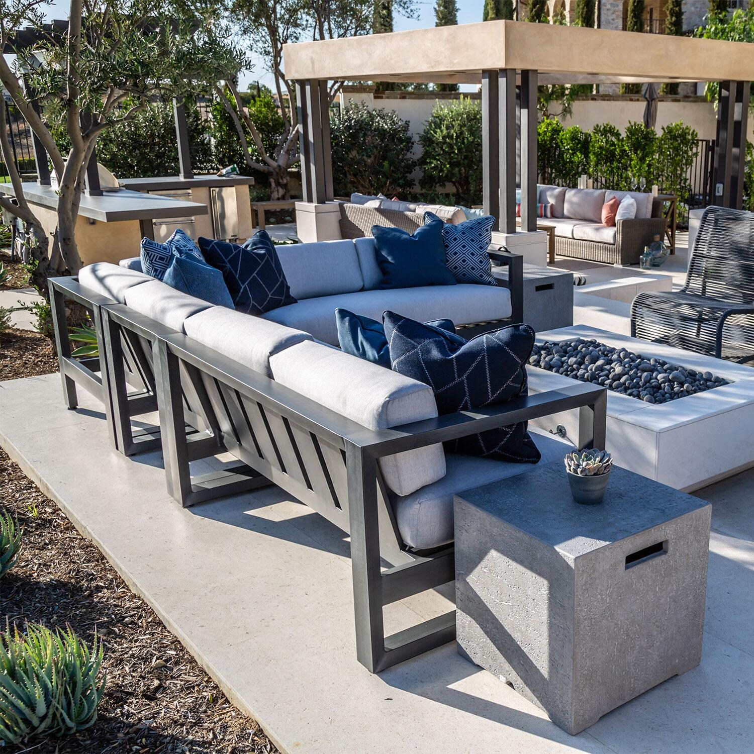 Redondo 3 Piece Aluminum Patio Sectional W/ Sunbrella Cast Silver Cushions By Sunset West - Back Patio - Rear View - Lifestyle thumbnail