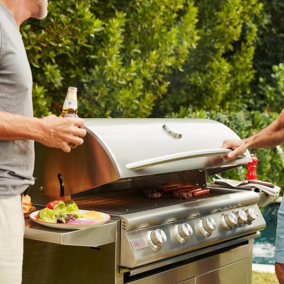 Blaze BLZ-5LTE3-NG Premium LTE+ 40-Inch 5-Burner Natural Gas Grill With Rear Infrared Burner & Lift-Assist Hood - Men Chatting By Grill - Lifestyle thumbnail