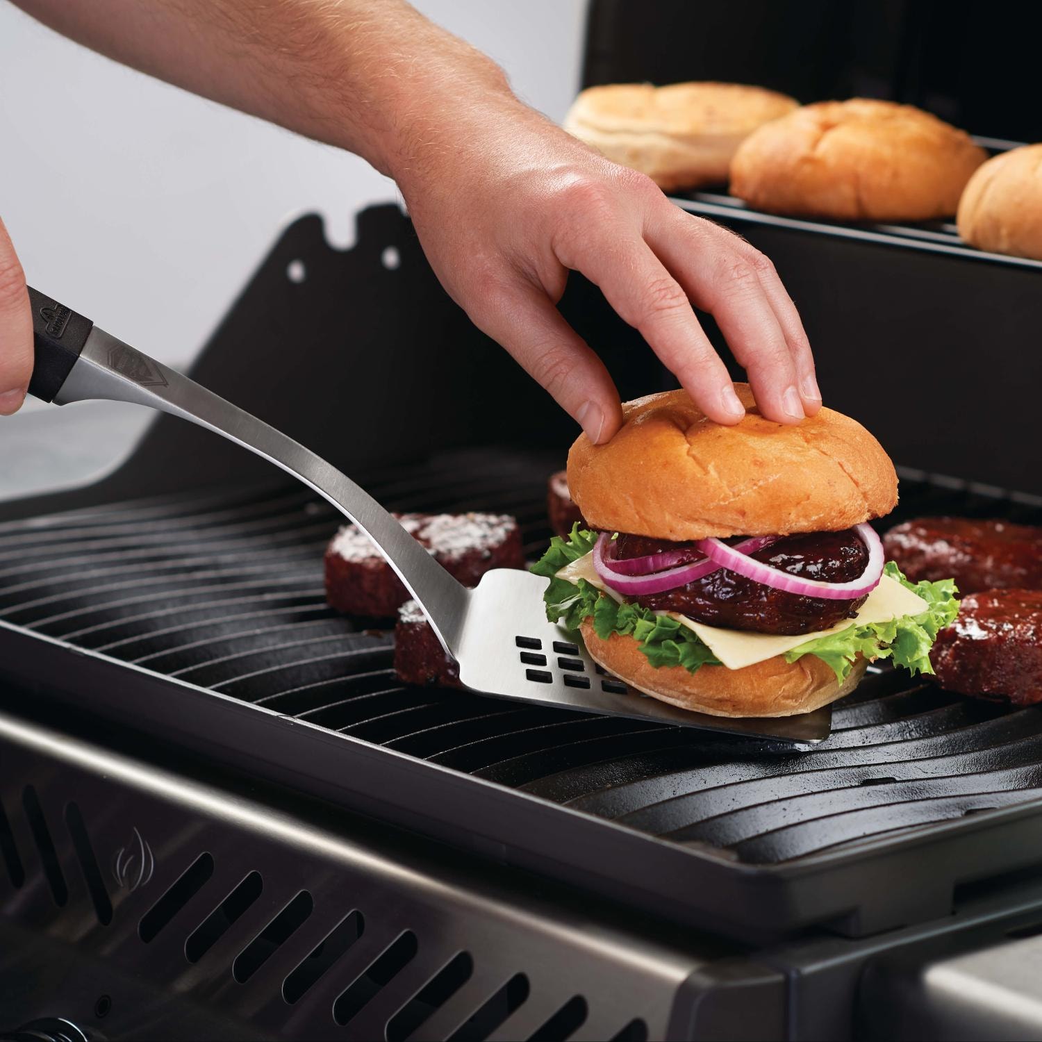 Napoleon Executive 3-Piece Stainless Steel BBQ Spatula In Use thumbnail
