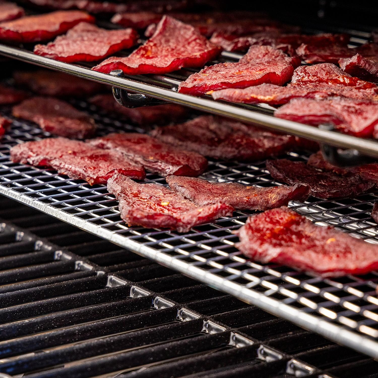 Pit Boss 11107 Sportsman 1100 Pellet Grill w/ WiFi - Cooking Meat - Detail thumbnail