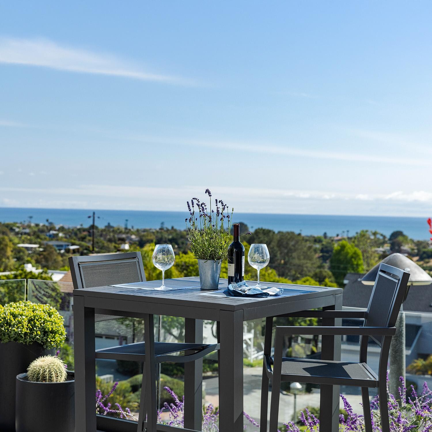 Sunset West Vegas 36-Inch Square Aluminum Patio Pub Table W/ Umbrella Hole - Shown w/ Set Zoomed In - Lifestyle thumbnail