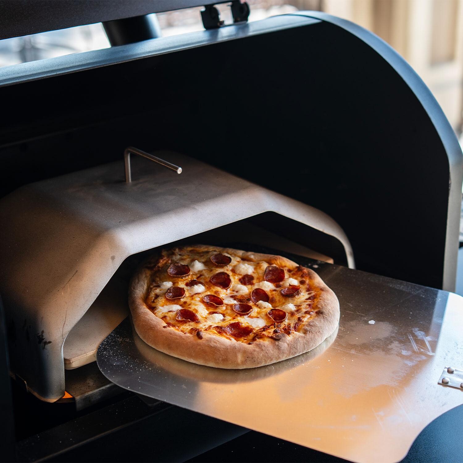 Green Mountain Grills Peak Prime 2.0 WiFi Pellet Grill w/ Cover - Wood-Fired Pizza (Pizza Attachment Sold Separately) - Lifestyle thumbnail