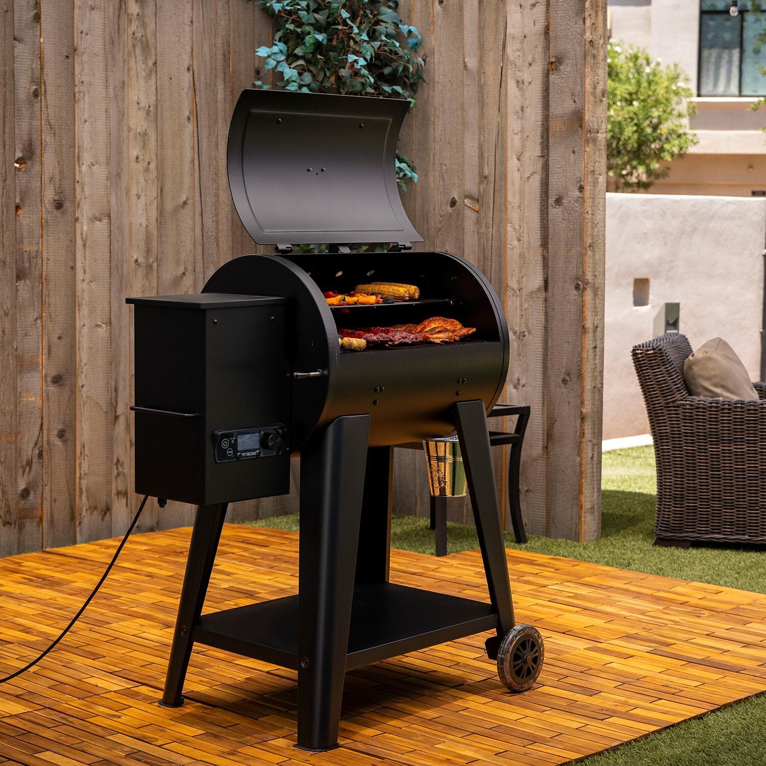 Pit Boss 700FB2 Pellet Grill - Matte Black - Open Angled Right - Lifestyle thumbnail