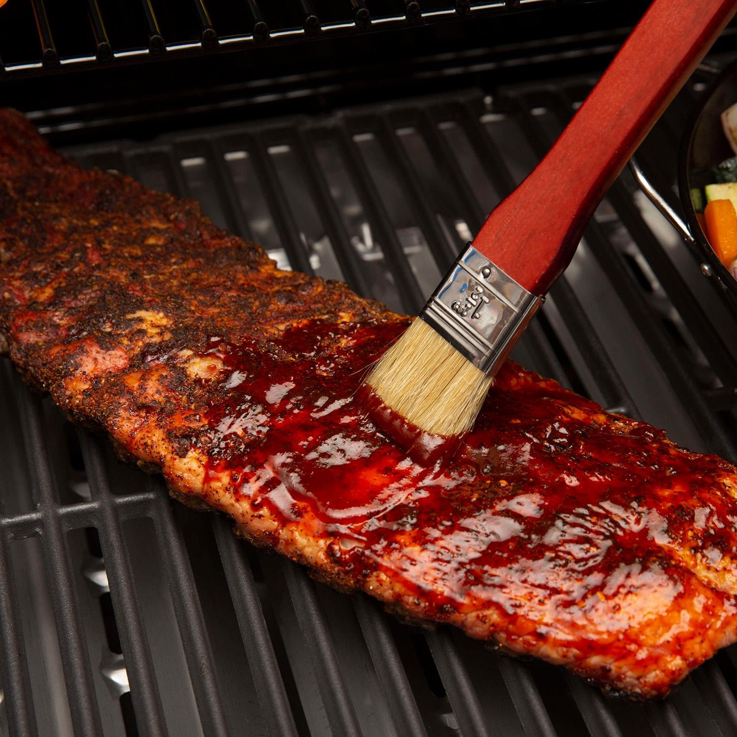 GrillPro 18-in Wood Handle Basting Brush - 42044 - Brushing Ribs - Lifestyle thumbnail