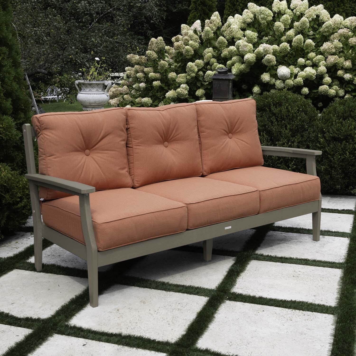Blushing Bay 3 Person Recycled Plastic Sofa in Canvas Persimmon/Woodland Brown by Lakeview Outdoor Designs - Left Angled - Lifestyle thumbnail