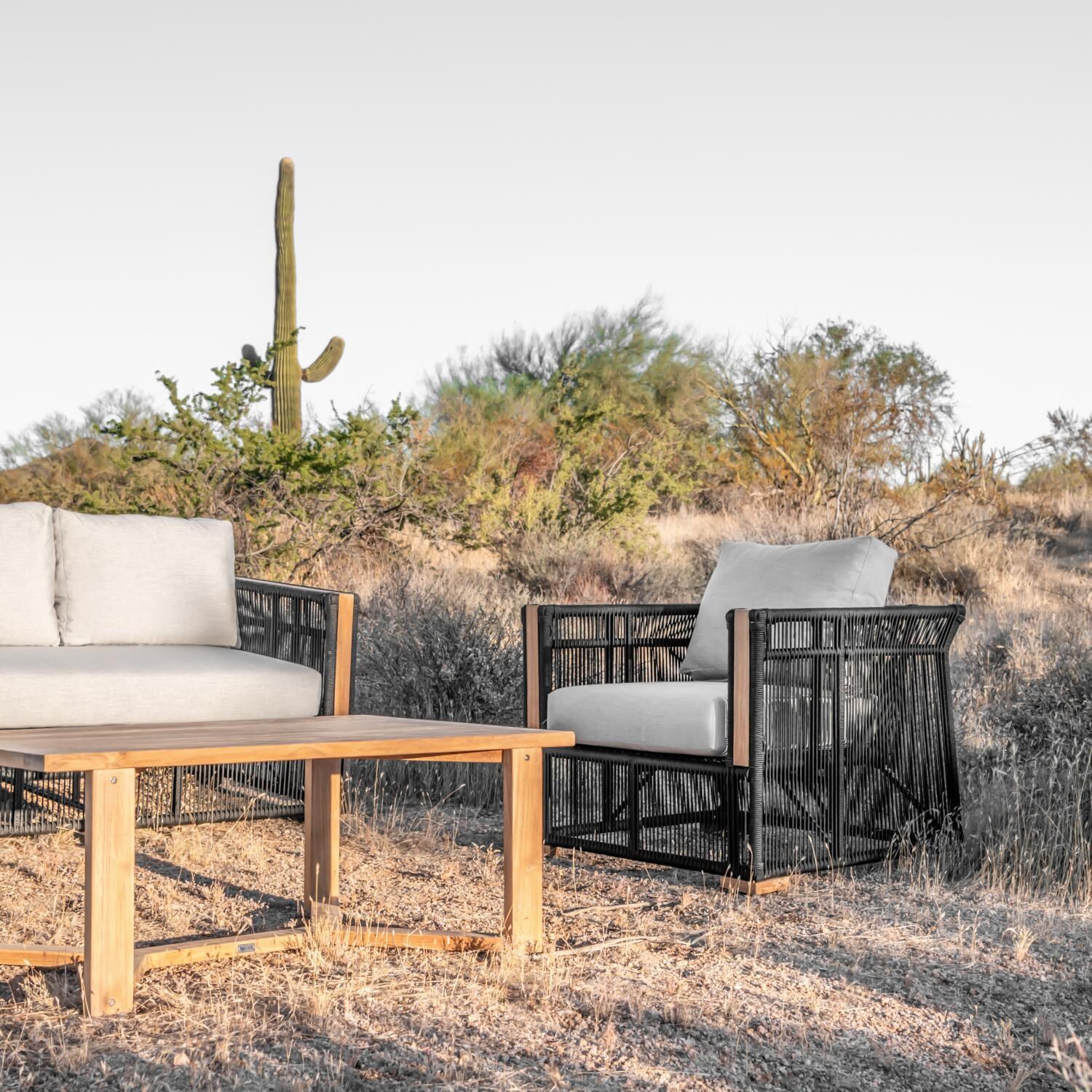 Teak + Table Breeze Olefin Rope & Teak Patio Club Chair in Charcoal/Sand - Desert Chat Set Close-Up - Lifestyle thumbnail