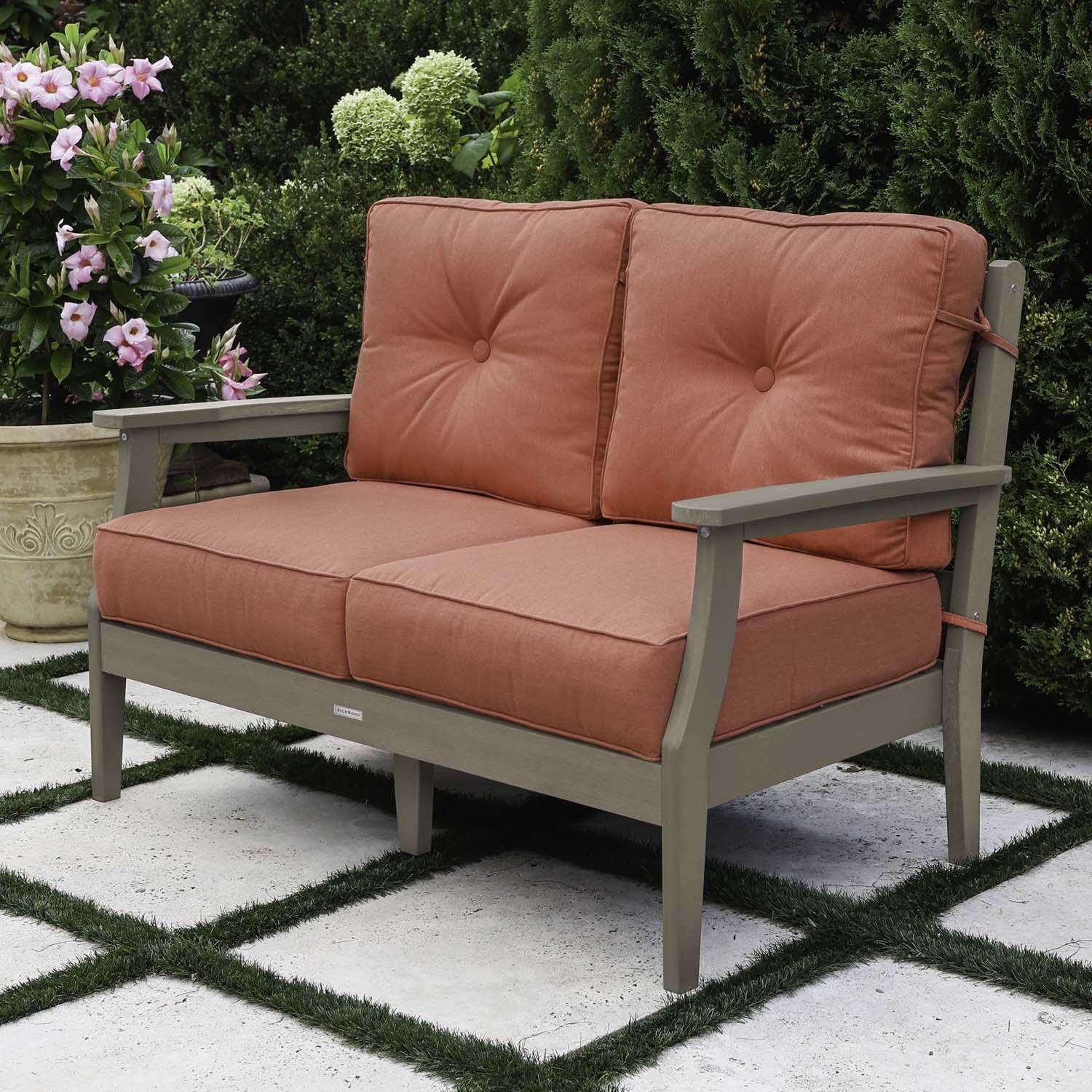 Blushing Bay 2 Person Recycled Plastic Loveseat in Canvas Persimmon/Woodland Brown by Lakeview Outdoor Designs - Right Angled - Lifestyle thumbnail