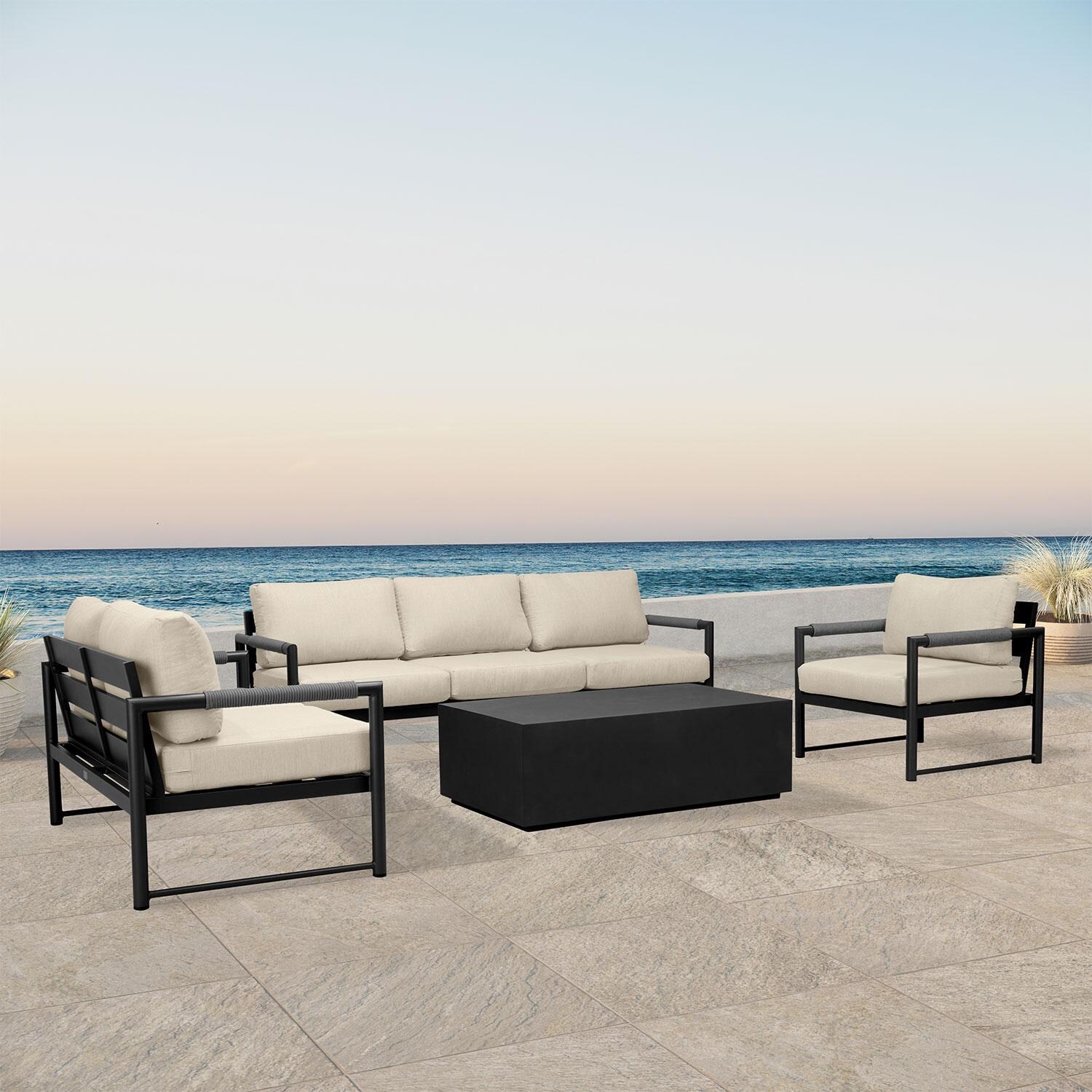 Lakeview AVEBAY-BK-CO-SET137-CF Avenue Bay Black/Carbon 4 Pc Sofa Loveseat Set - Canvas Flax - Angled On Patio - Lifestyle thumbnail