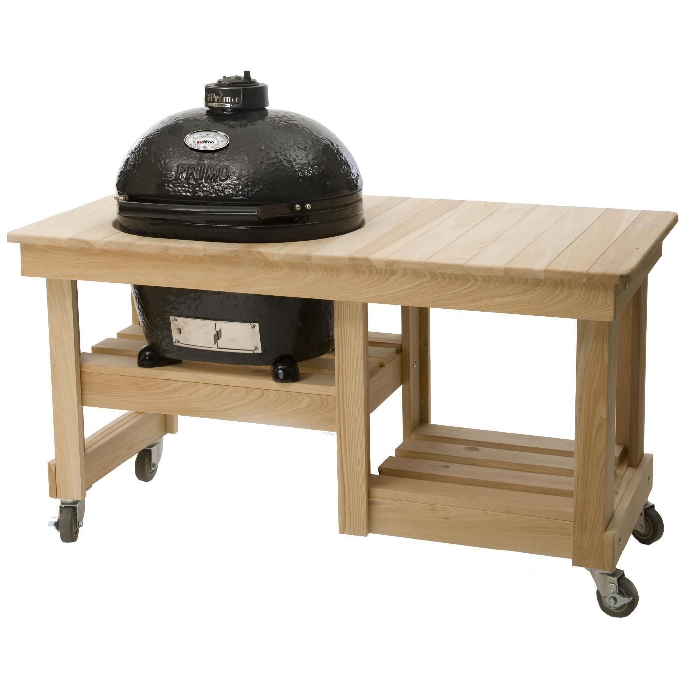 Primo Oval Large Ceramic Charcoal Smoker Grill On Countertop Cypress Table - Angled View thumbnail