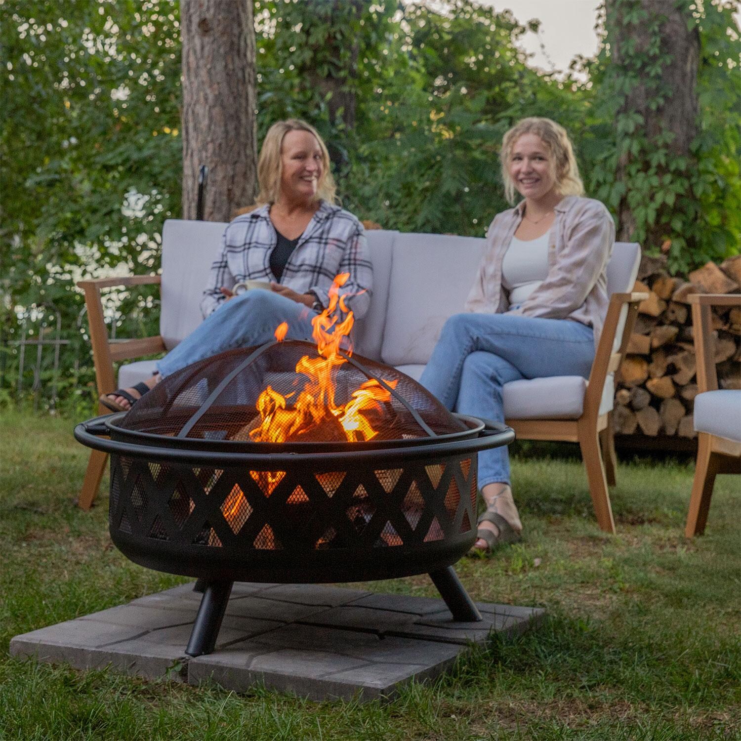 Ultimate Patio Crossweave 36 Inch Round Steel Wood-Burning Fire Pit in Black - Lakeside Patio - Lifestyle thumbnail