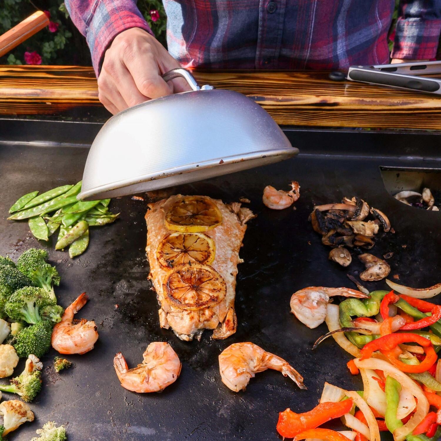 Backyard Hibachi BH-TorchedSteel Flattop Propane Gas Grill - Torched Steel - Cooking Fish And Vegetables thumbnail