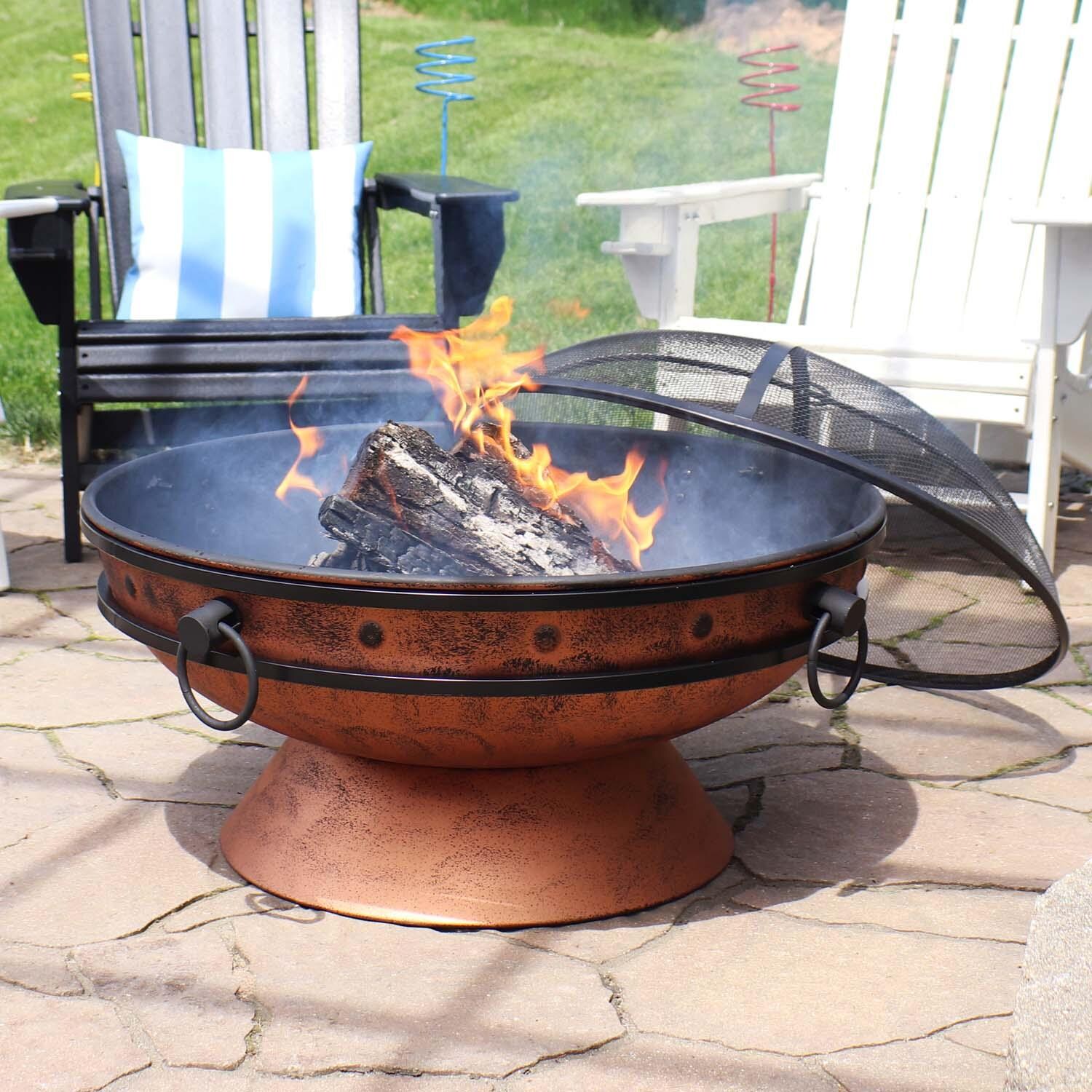 Cauldron 31-in Round Steel Wood-Burning Fire Pit in Copper by Ultimate Patio - Lid Off - Lifestyle thumbnail
