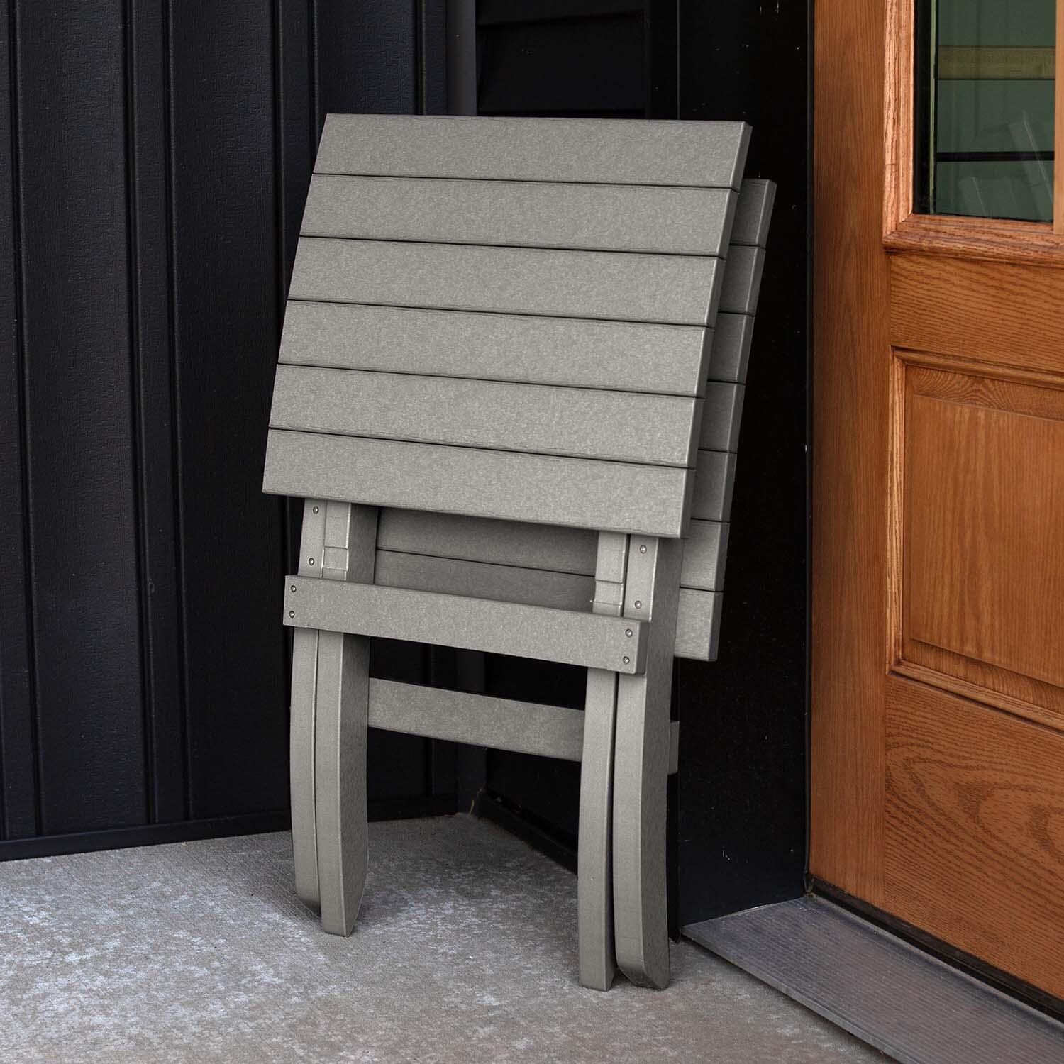 Hazel Cove Recycled Plastic Folding & Stacking Dining Side Chair in Cove Gray by Lakeview Outdoor Designs - Folded - Lifestyle thumbnail