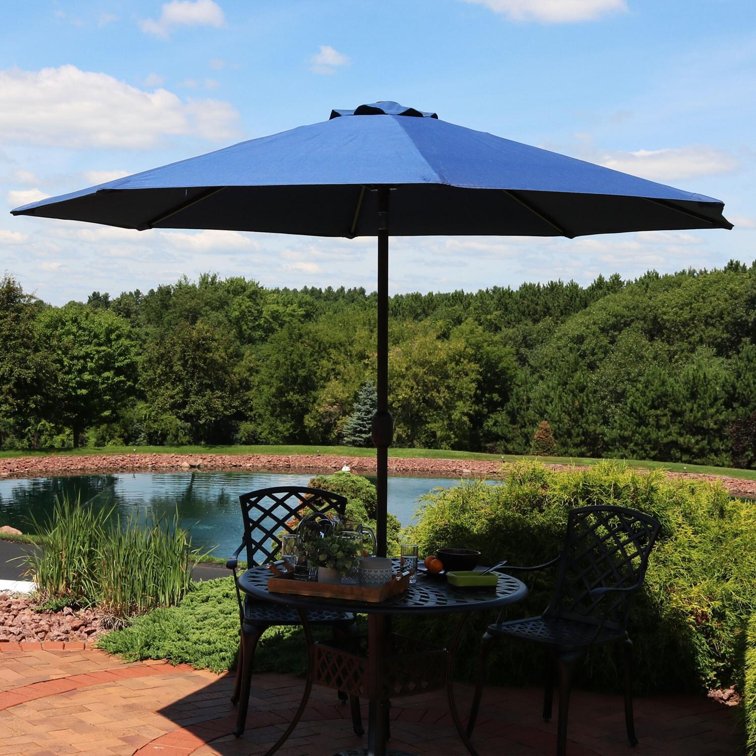 Ultimate Patio 9 Ft. Octagonal Patio Umbrella W/ Crank & Tilt - Navy Blue - Lifestyle View thumbnail