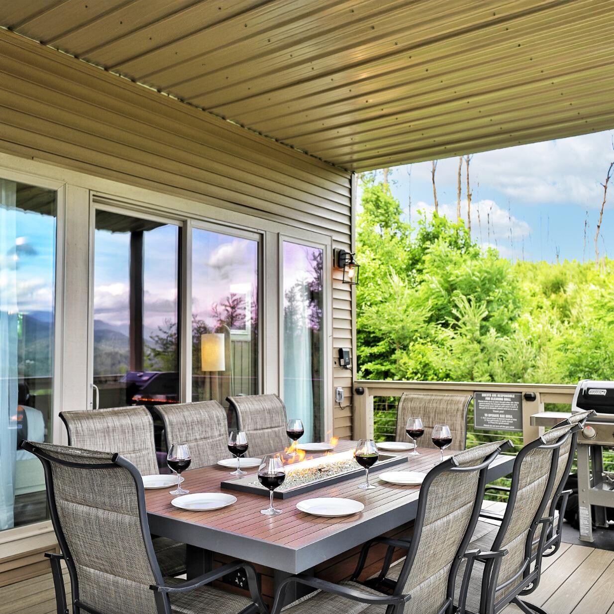 Lakeview Outdoor Designs Revere 80-Inch Linear Natural Gas Fire Pit Dining Table with 42-Inch Crystal Fire Burner - Ships As Propane With Conversion Fittings - Covered Patio - Lifestyle thumbnail