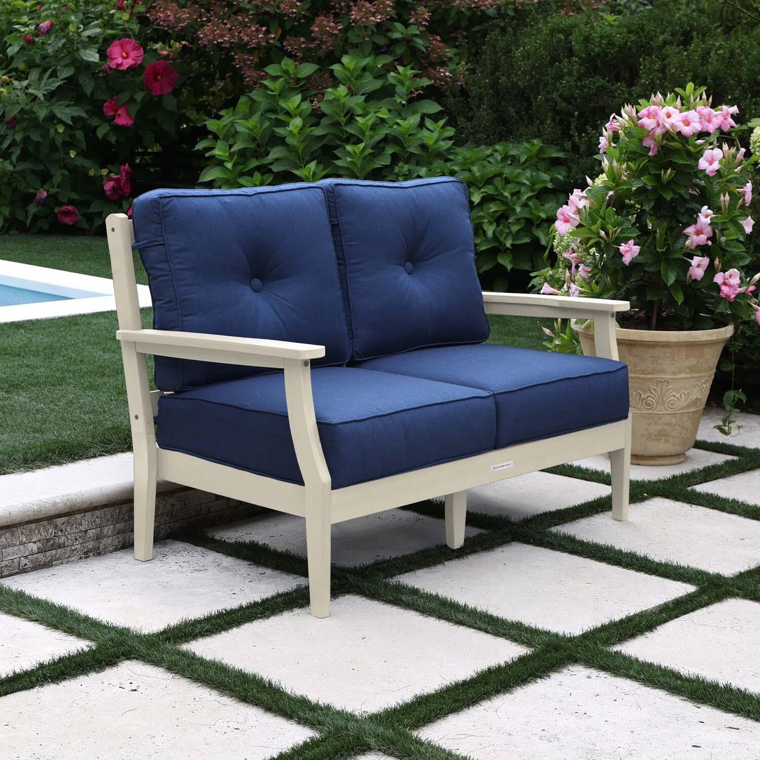 Blushing Bay 2 Person Recycled Plastic Loveseat in Spectrum Indigo/Whitewash by Lakeview Outdoor Designs - Left Angled - Lifestyle thumbnail