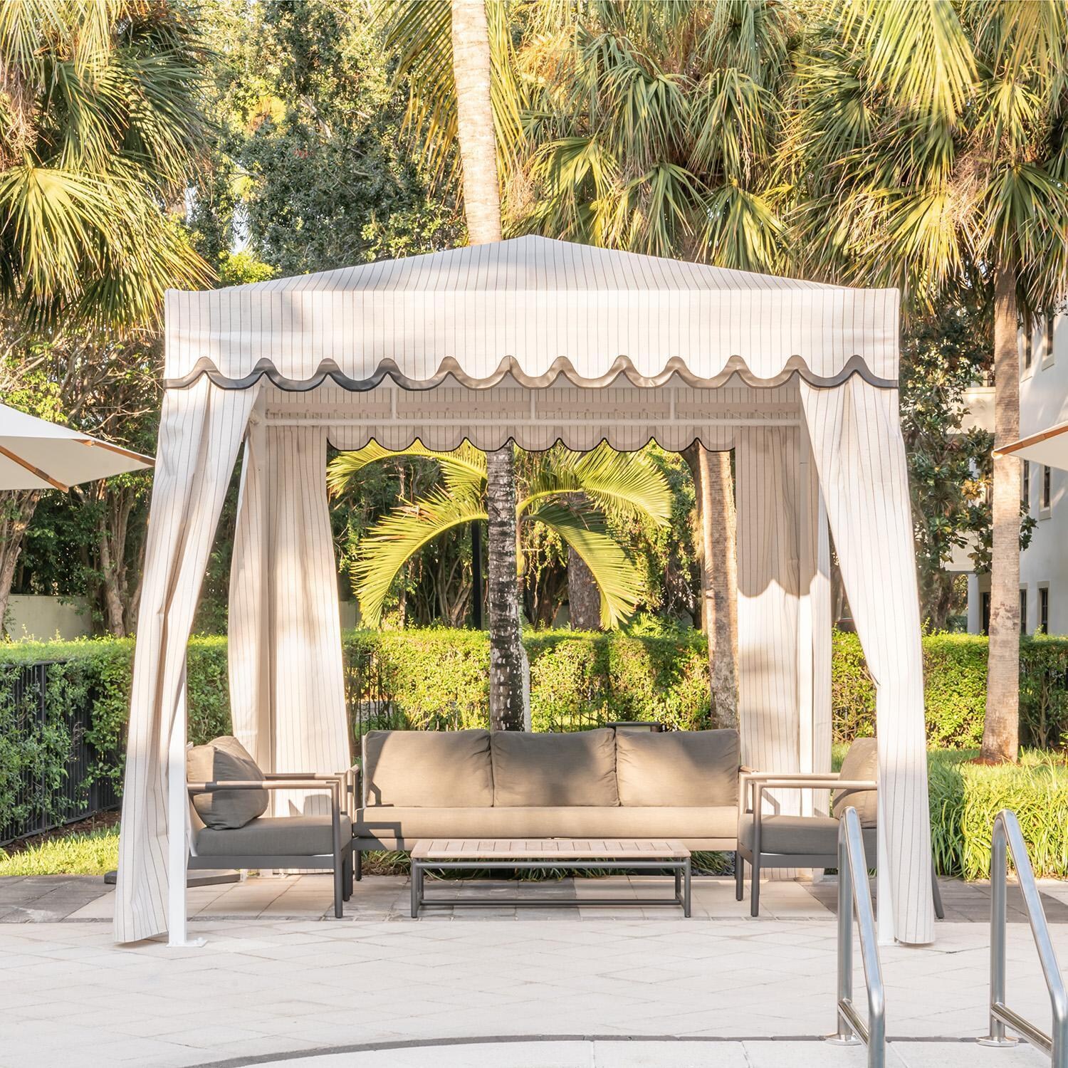 Teak + Table Barbados 51 Inch Rectangular Coffee Table in Asteroid - Poolside - Lifestyle thumbnail