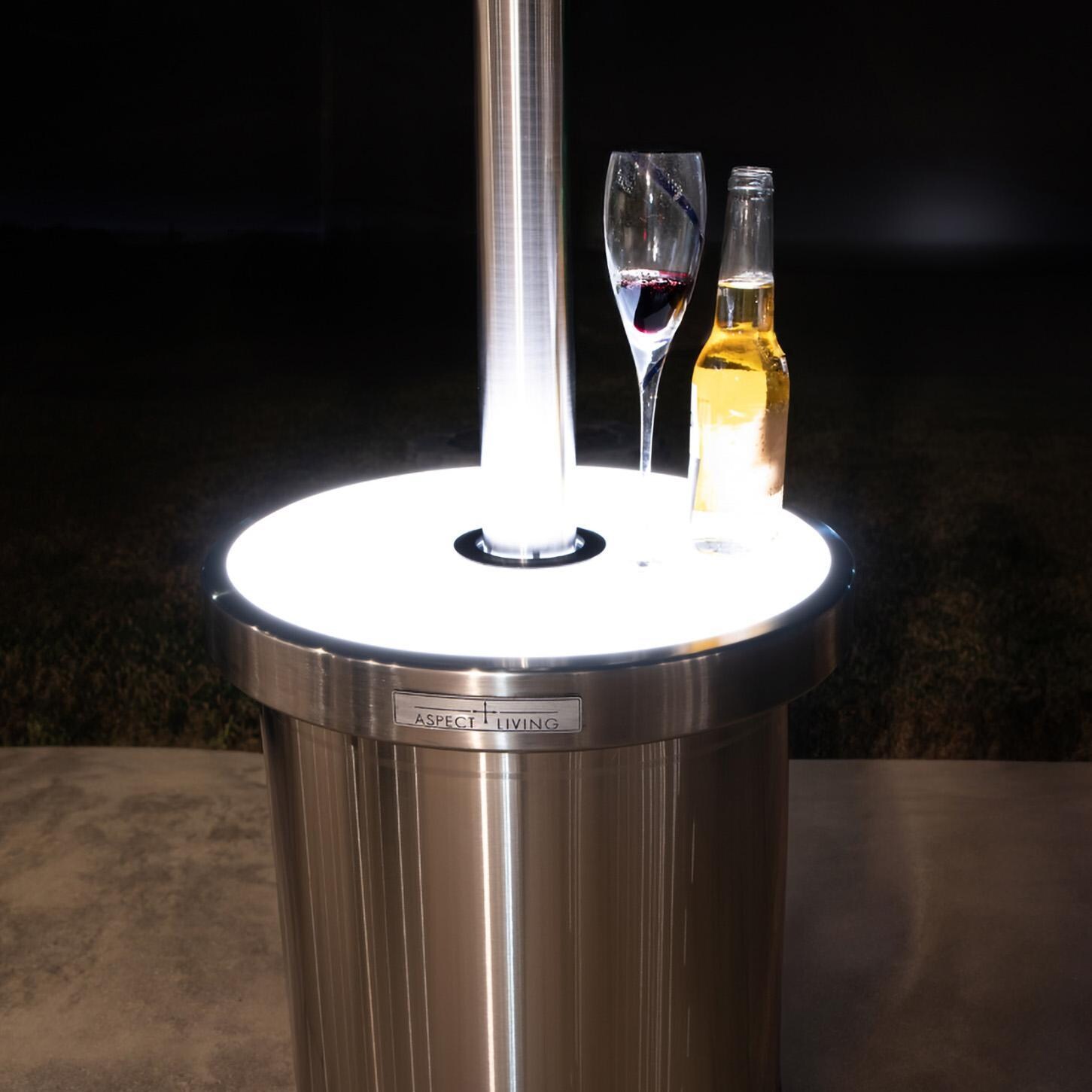 Ultimate Patio SC65046 48,000 BTU Propane Outdoor Patio Heater w/ LED Lighted Table - Stainless Steel - Light On Up Close - Lifestyle thumbnail