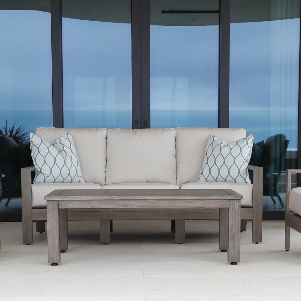 Laguna Aluminum Patio Sofa W/ Sunbrella Canvas Flax Cushions By Sunset West - On Patio - Lifestyle thumbnail