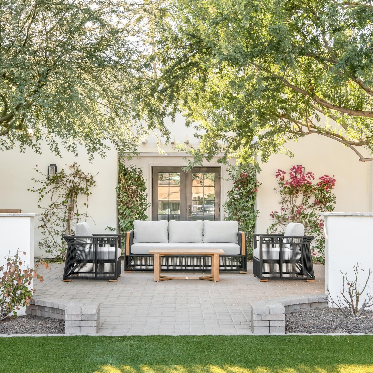 Teak + Table Breeze Olefin Rope & Teak Patio Sofa in Charcoal/Granite - Patio Landscape View - Lifestyle thumbnail