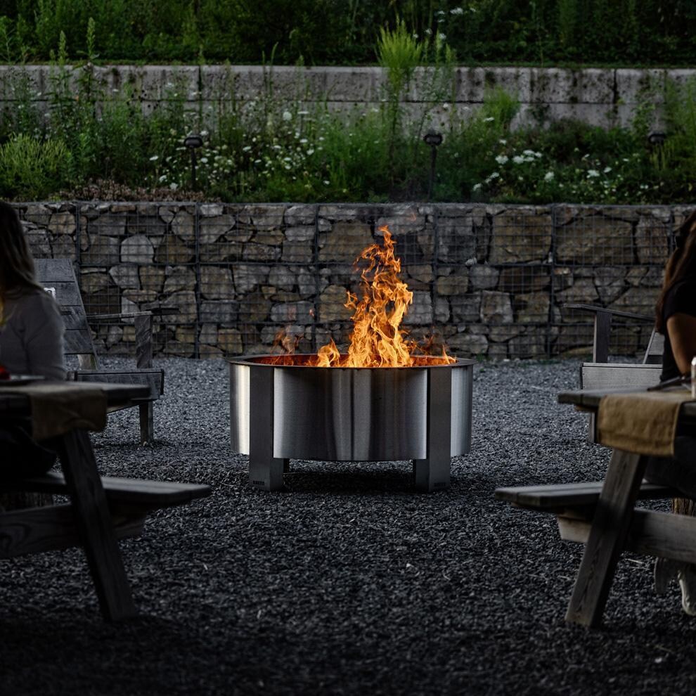 Breeo BR-XL42SS-LD X Series 42 Inch Round Stainless Steel Fire Pit Lid - At Night - Lifestyle thumbnail