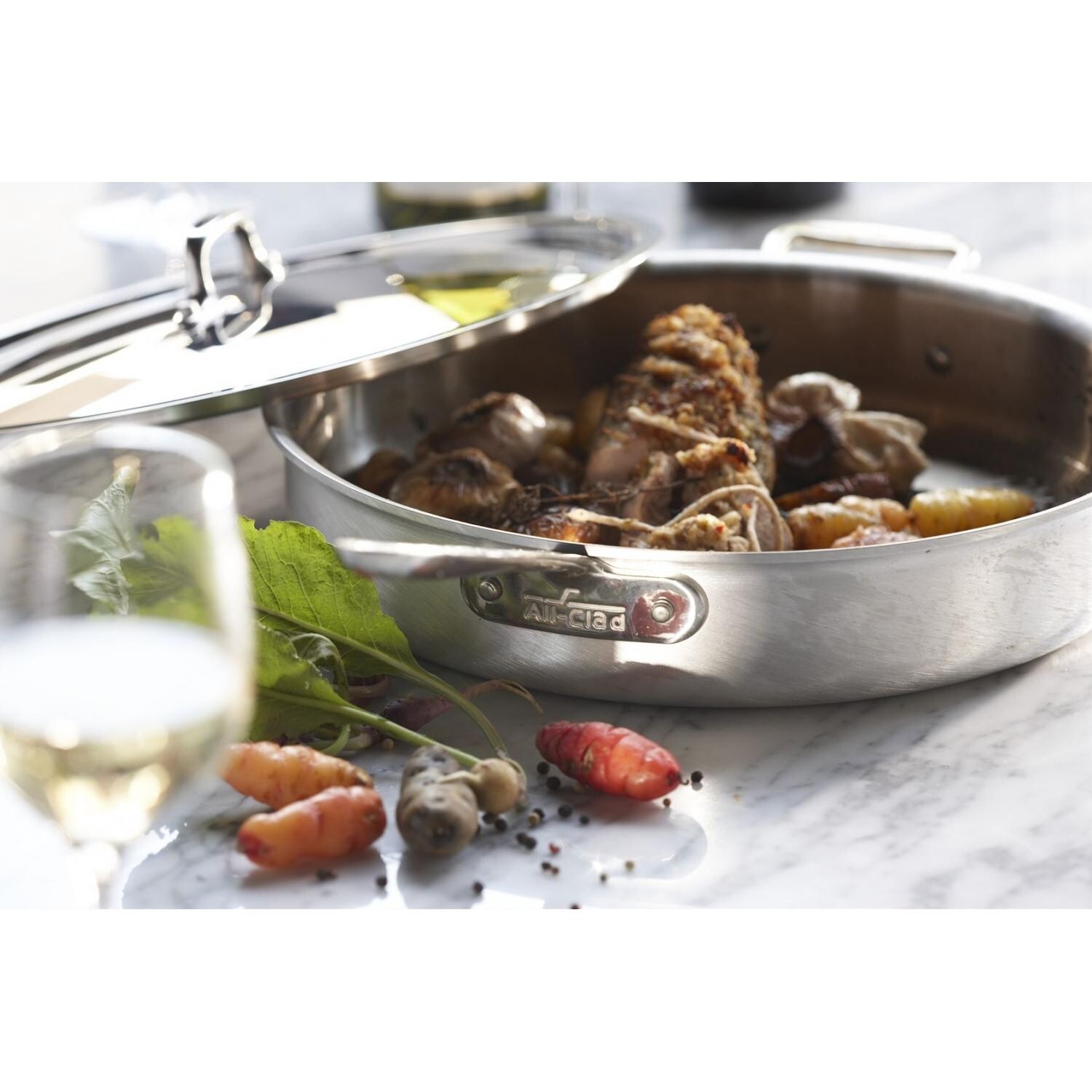 All-Clad MC2 Stainless 3-Quart Saute Pan With Lid In Use thumbnail