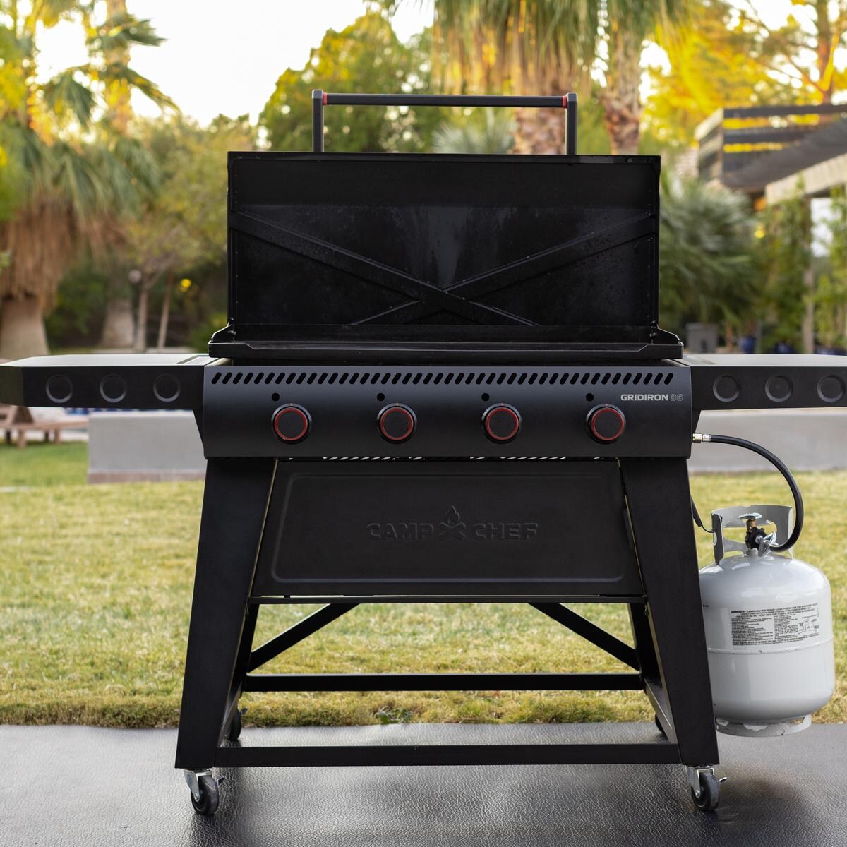 Camp Chef FTG36 36 Inch Gridiron Griddle - Front Shelves Up Lid Up - Lifestyle thumbnail