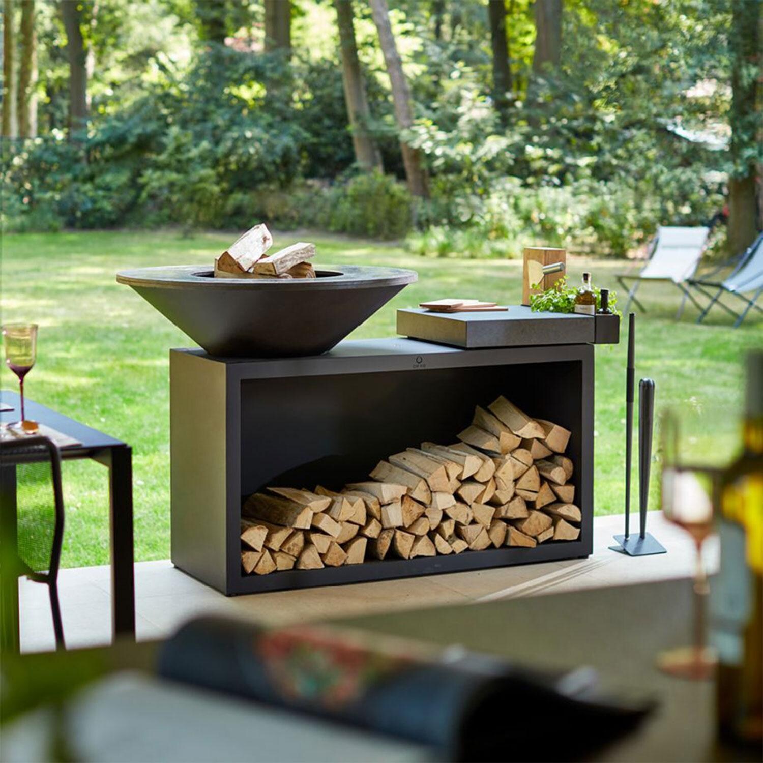 OFYR OIB-85-CD Island Black 85 Ceramic Dark Grey 35 Inch Wood-Fired Flat Top Grill - Back Patio - Lifestyle thumbnail