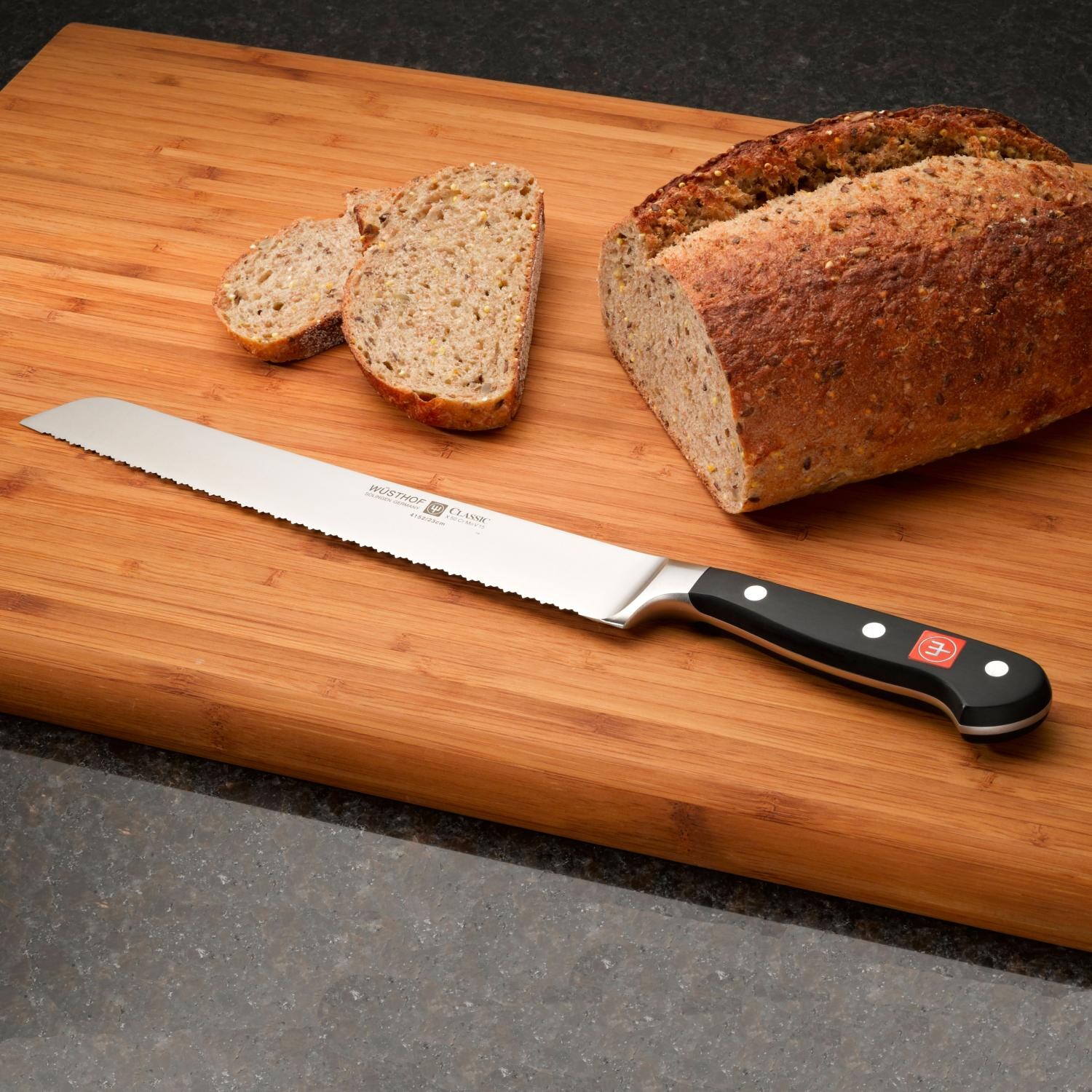 Wusthof Classic 9-Inch Double-Serrated Bread Knife - In Use thumbnail