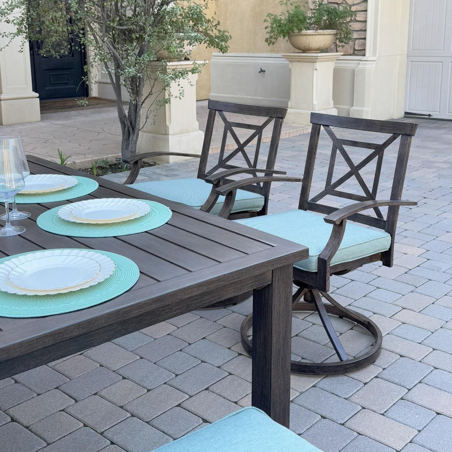 Atlantis 7 Pc Aluminum Dining Set w/ 4 Swivel Rocker Dining Arm Chairs & 2 Two Person Benches in Walnut/Spa by Darlee - Chairs At Table - Lifestyle thumbnail