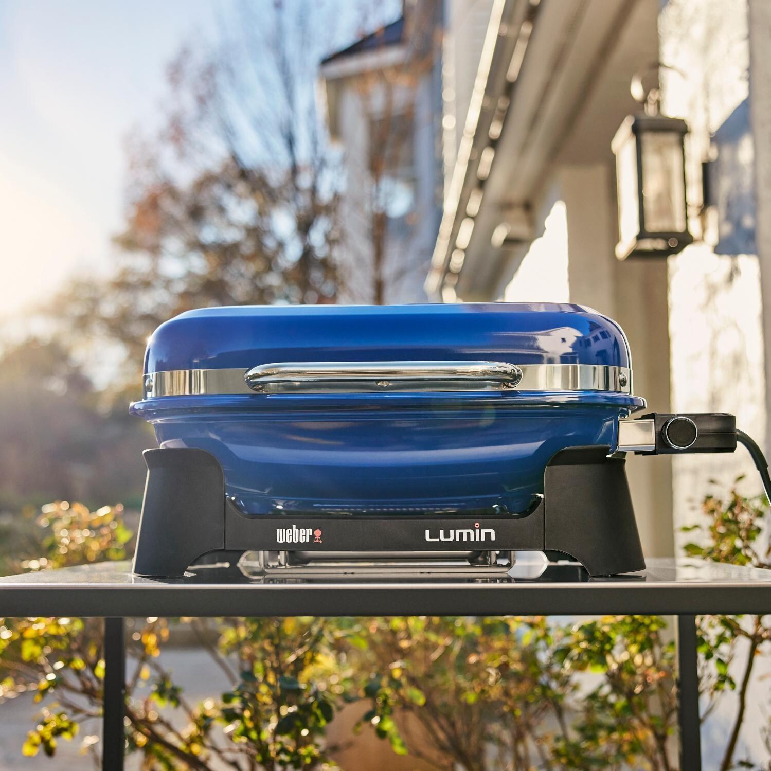 Weber 92300901 Deep Ocean Blue Lumin Portable 1560 Watt Electric Grill - Lifestyle thumbnail