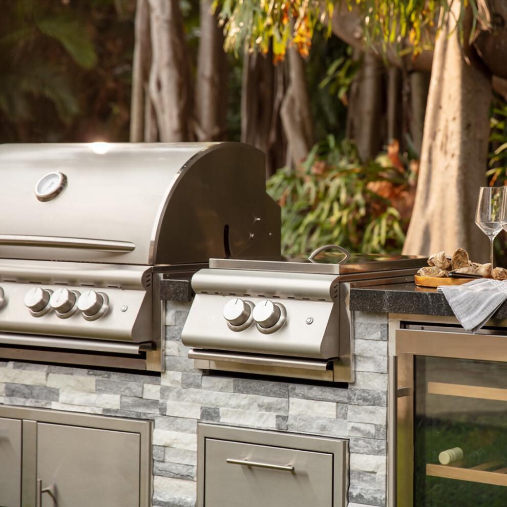 BBQGuys Signature 8 Ft Outdoor Kitchen Island w/ Blaze Premium LTE+ 32-Inch Natural Gas Grill, Premium LTE+ Power Burner, 24-Inch Beverage Cooler - Alaska Gray Stone w/ American Black Polished Granite - Power Burner - Lifestyle thumbnail