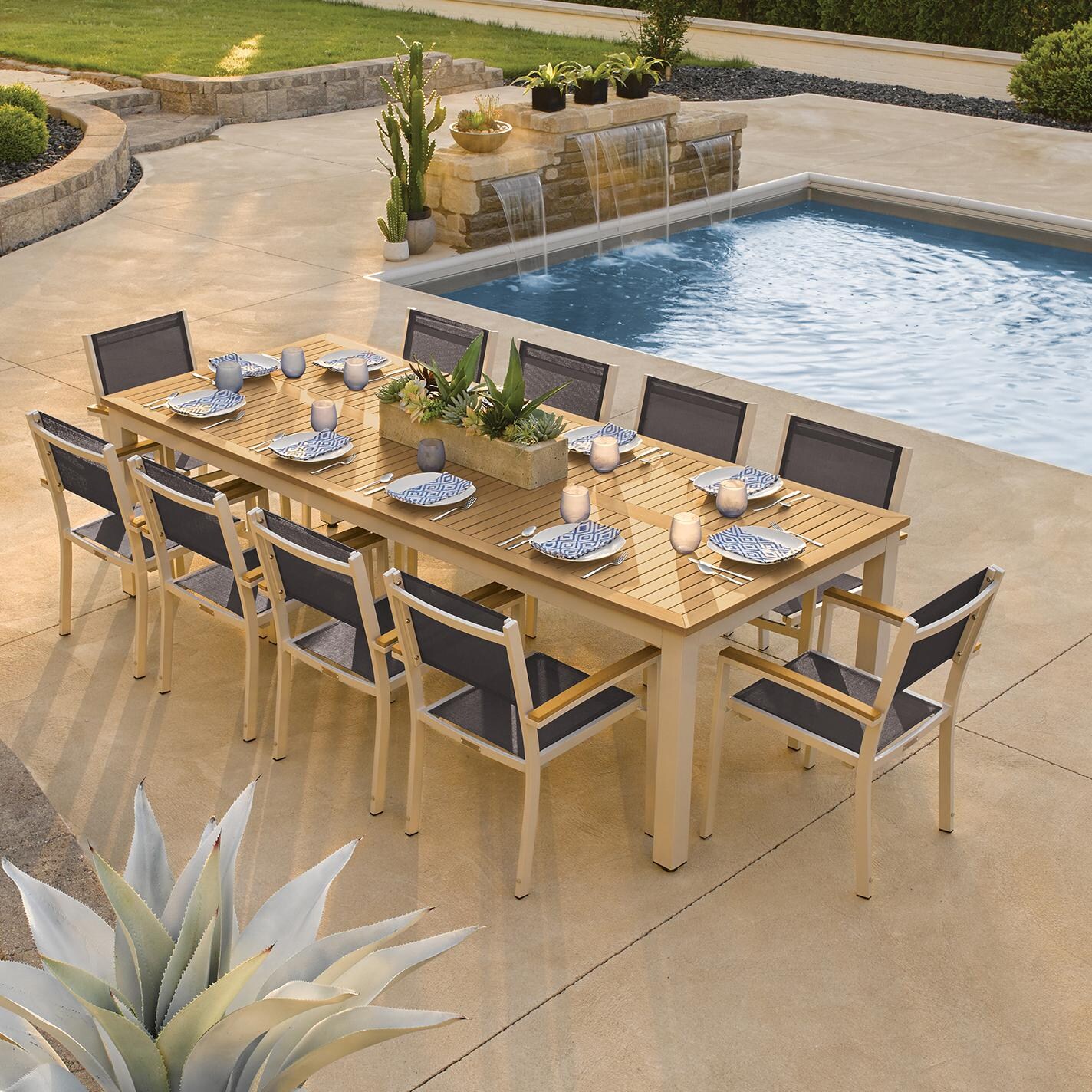 Travira 11 Piece Aluminum Patio Dining Set W/ 103 X 42 Inch Table and Tekwood Natural Tabletop By Oxford Garden - On The Patio thumbnail