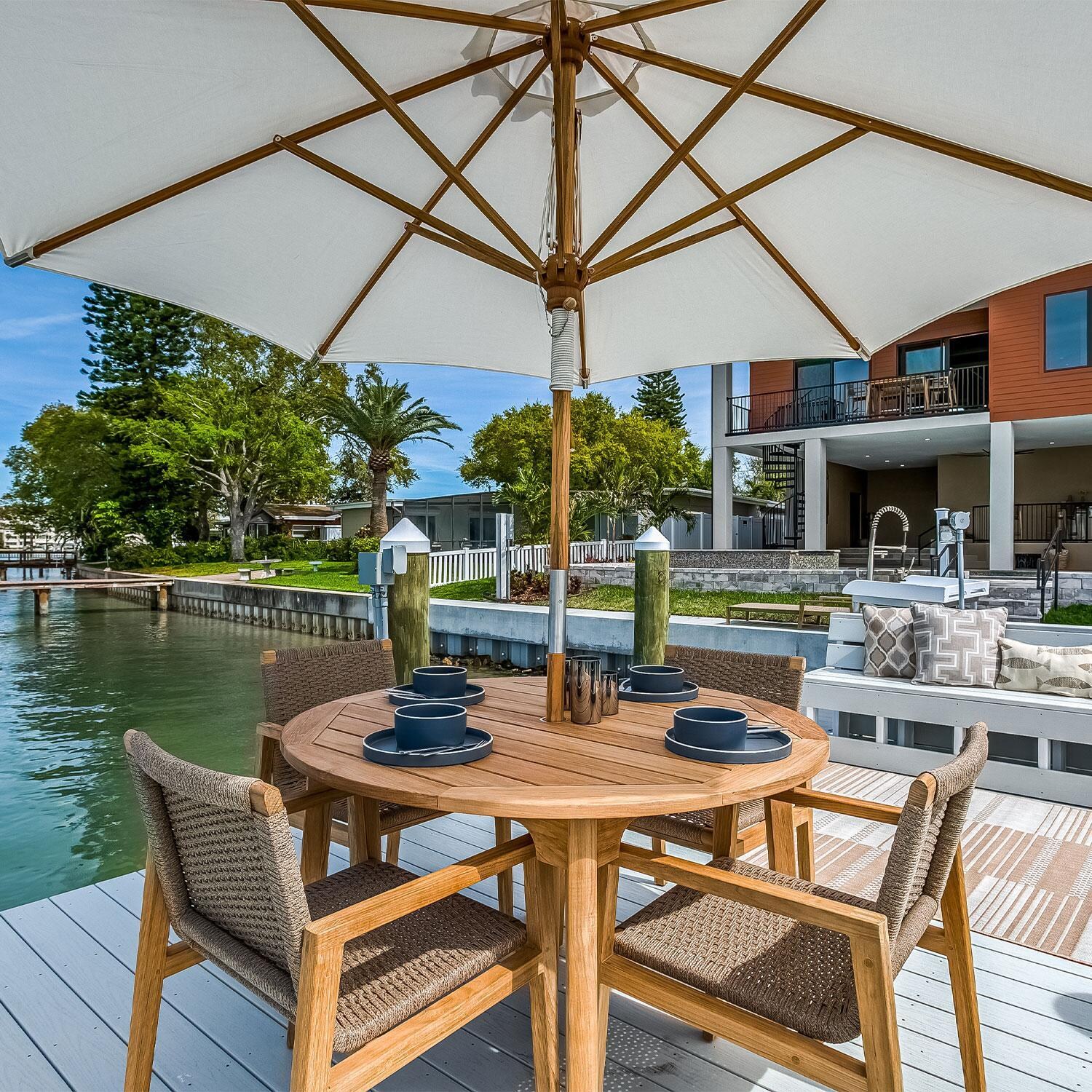 Admiral Rope Dining Chair in Charcoal Grey By Royal Teak Collection - Deck Setting (Shown in Brown Sand) - Lifestyle thumbnail