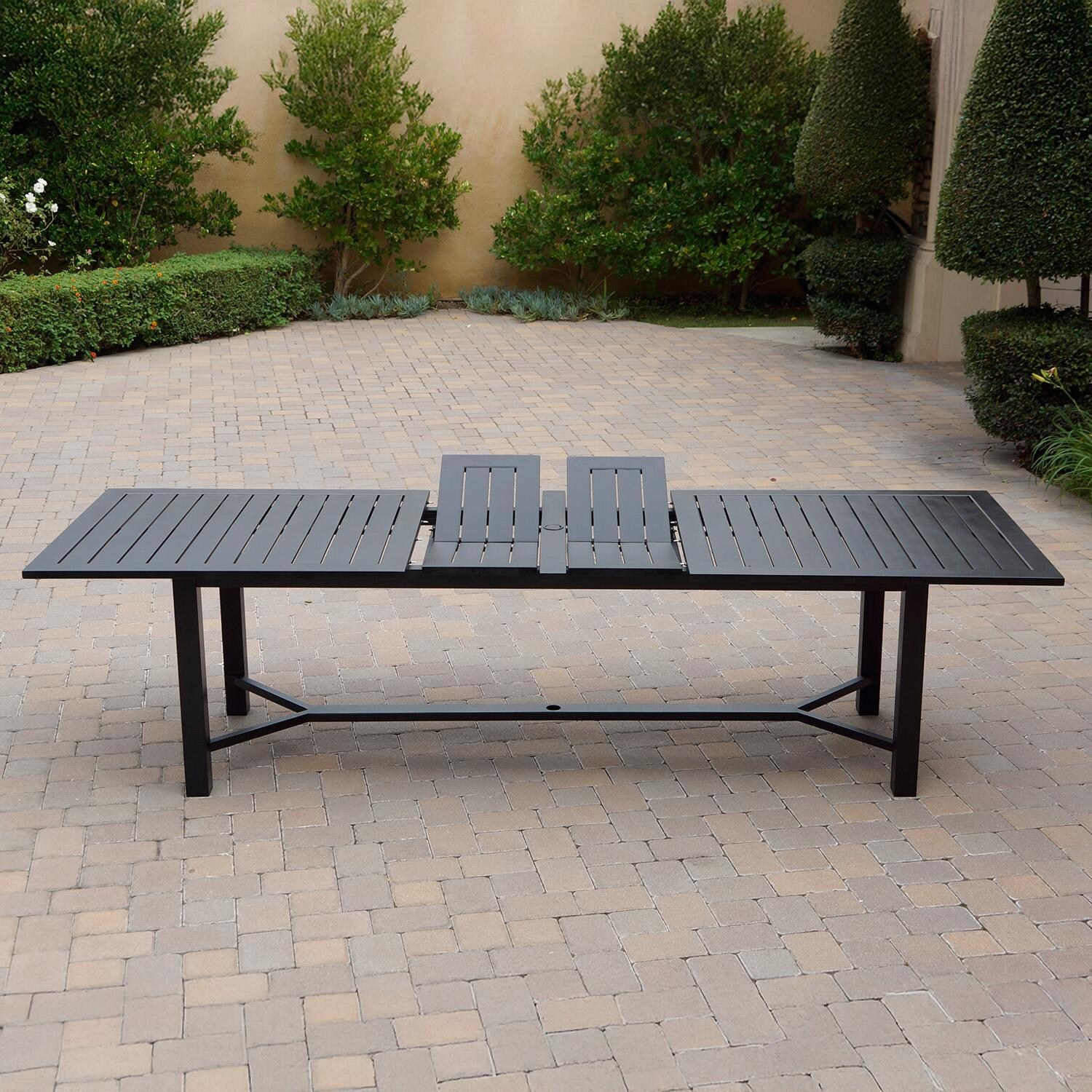 Darlee B/DL13-11PCDR-2350LE-S Nassau 11 Pc Cast Aluminum Dining Set w/ Rocker in Antique Bronze w/ Sesame Cushions - Table Side View w/ Extension - Lifestyle thumbnail