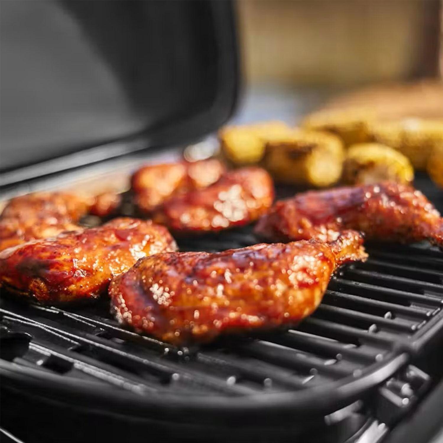 Weber 1500460 Traveler Compact Portable Propane Gas Grill - Food - Lifestyle thumbnail