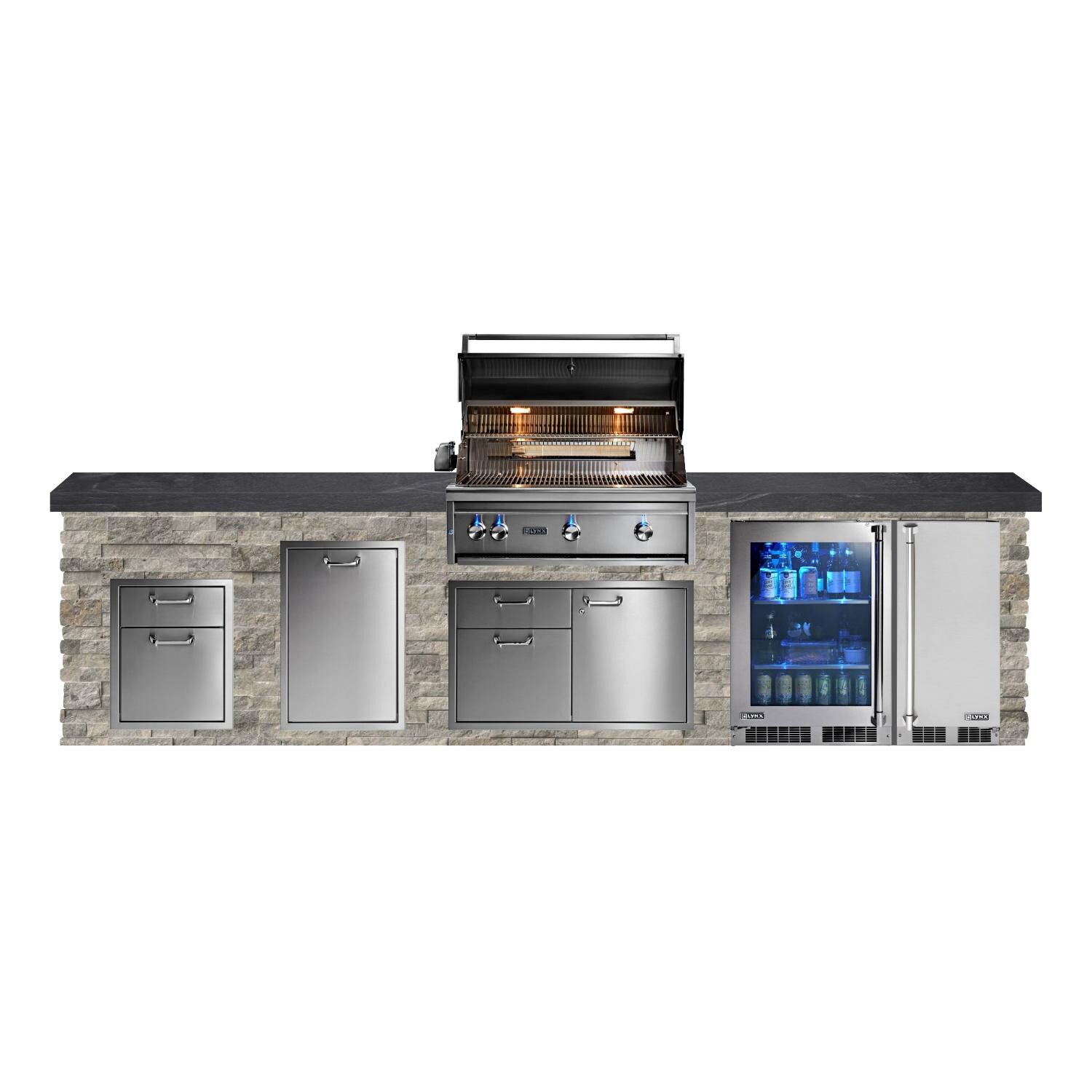 BBQGuys Signature 12ft Luxury Outdoor Kitchen w/ Lynx Professional 36-Inch Natural Gas Grill, Ice Maker & Refrigerator - Silver Travertine Stone w/ Black Polished Granite - White Background thumbnail