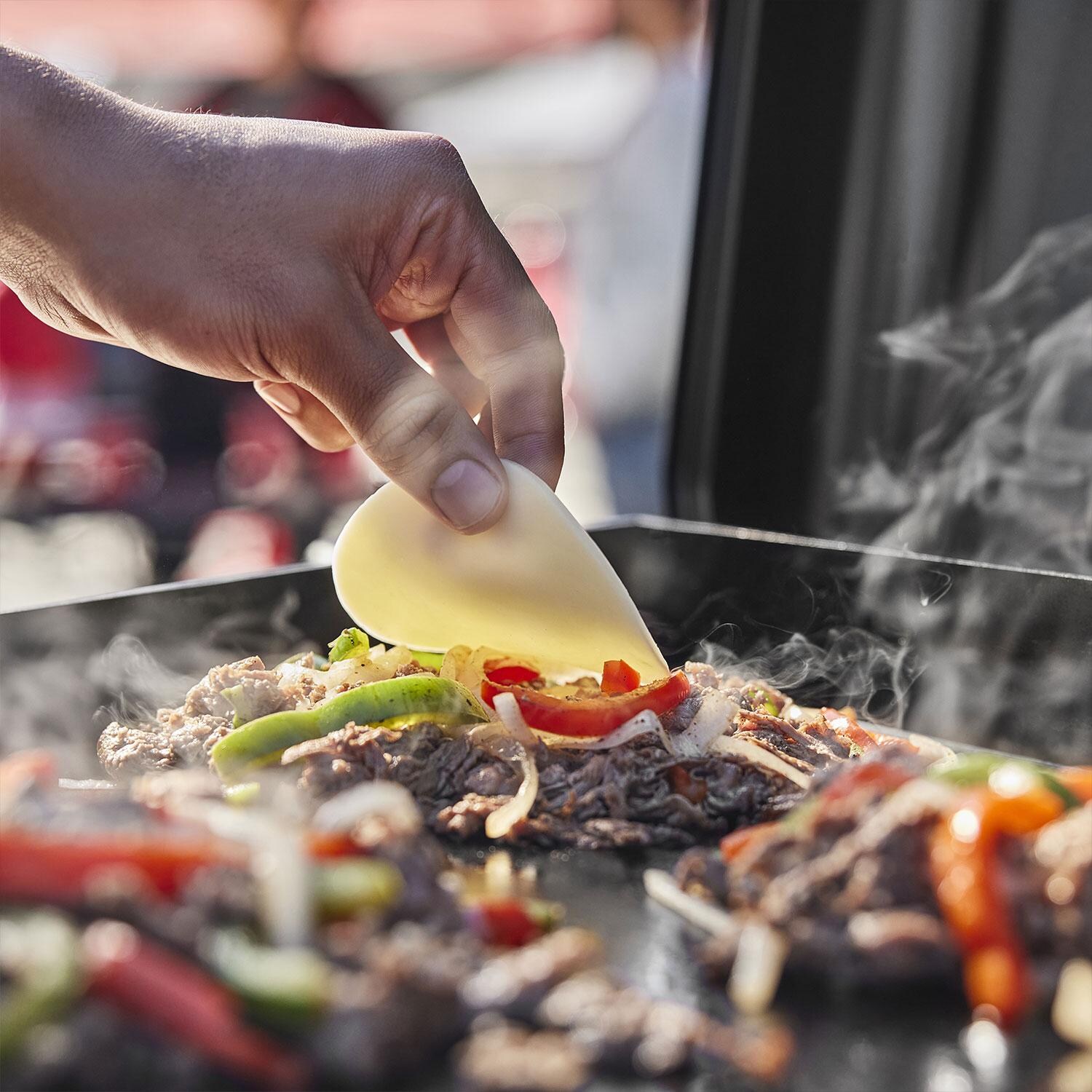 Weber 1500213 Traveler 22-Inch Portable Griddle - Food - Close Up - Lifestyle thumbnail