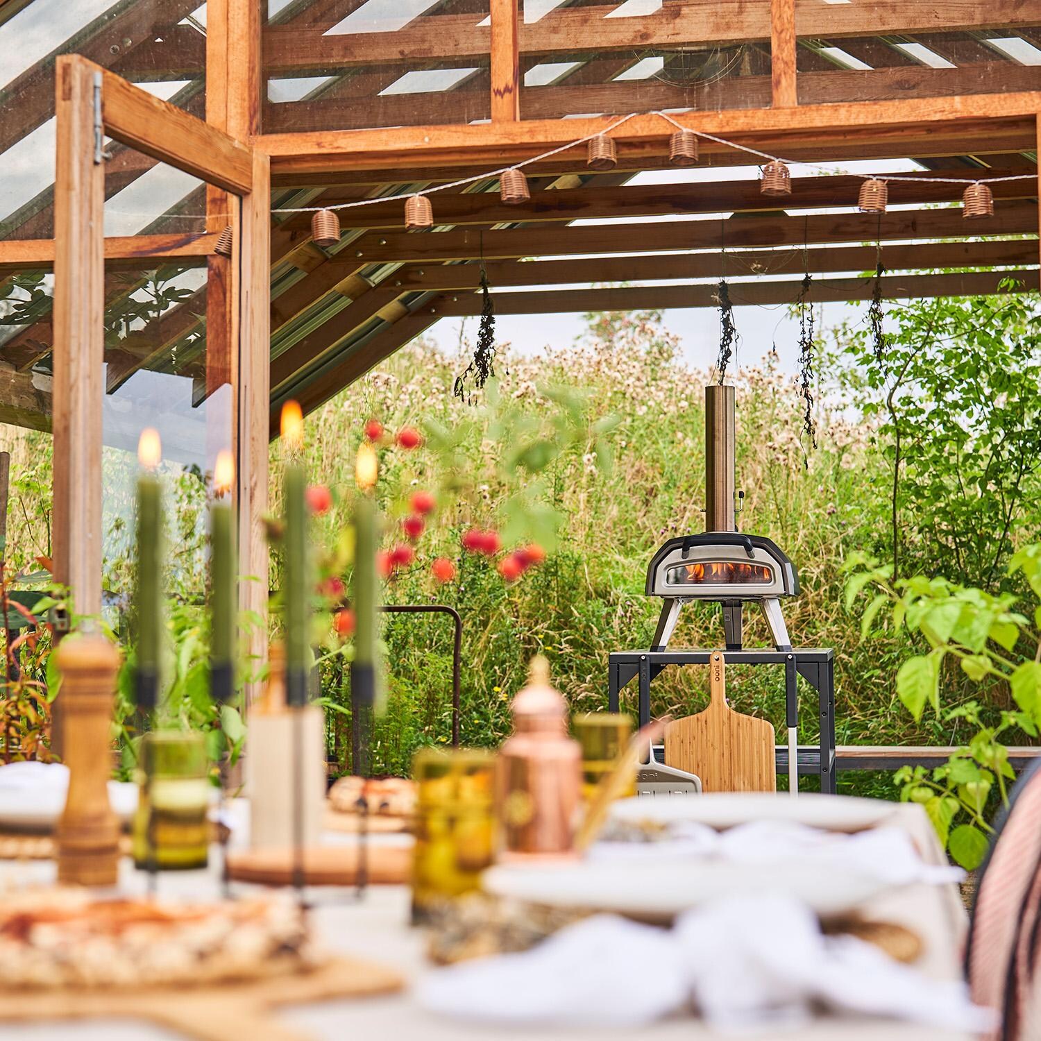 Ooni UU-P30300 Karu 2 Countertop Wood-Fired Pizza Oven - Dinner Party - Lifestyle thumbnail