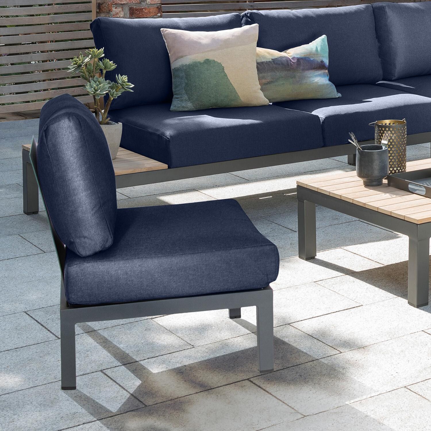 Elba Aluminum Club Chair w/ Teak Tabletop in Charcoal / Spectrum Indigo - On Patio - Lifestyle thumbnail
