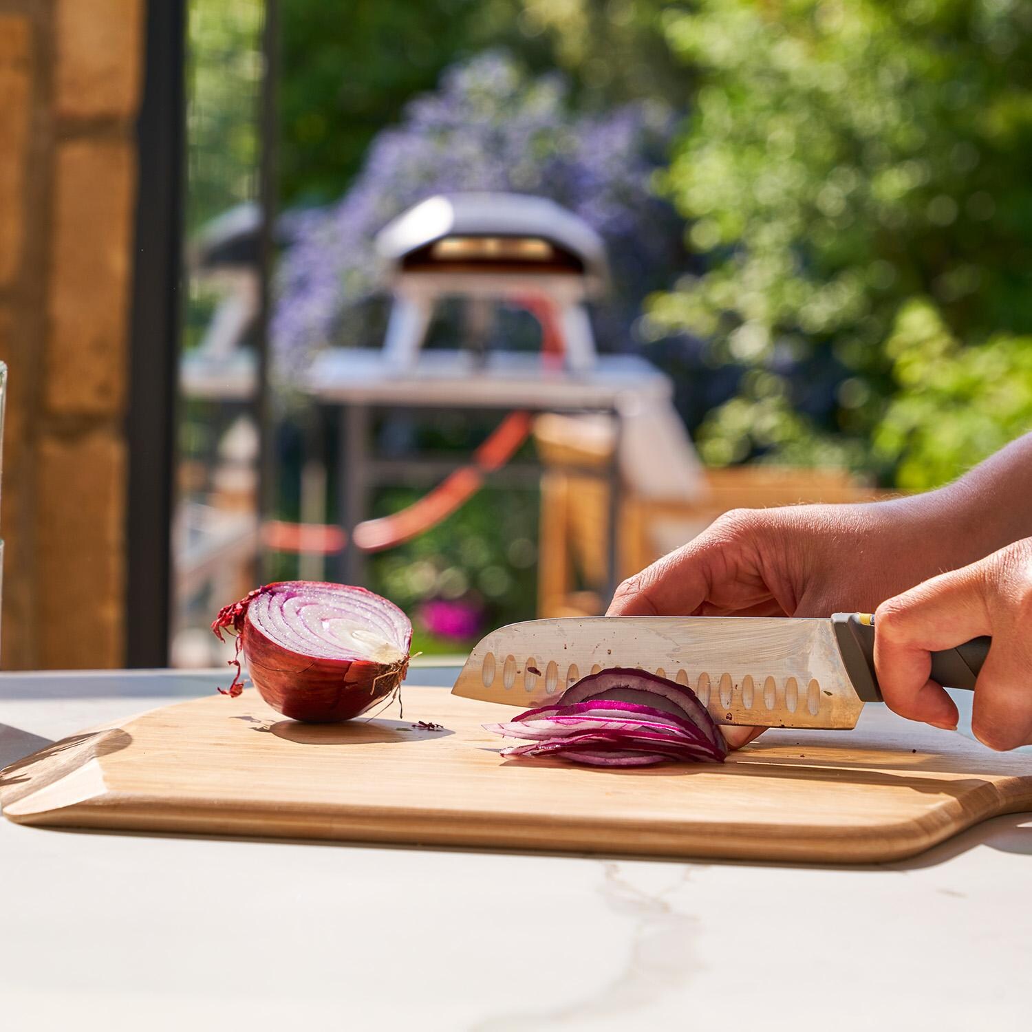 Ooni UU-P0B900 16-in Bamboo Peel & Serving Board - Lifestyle thumbnail